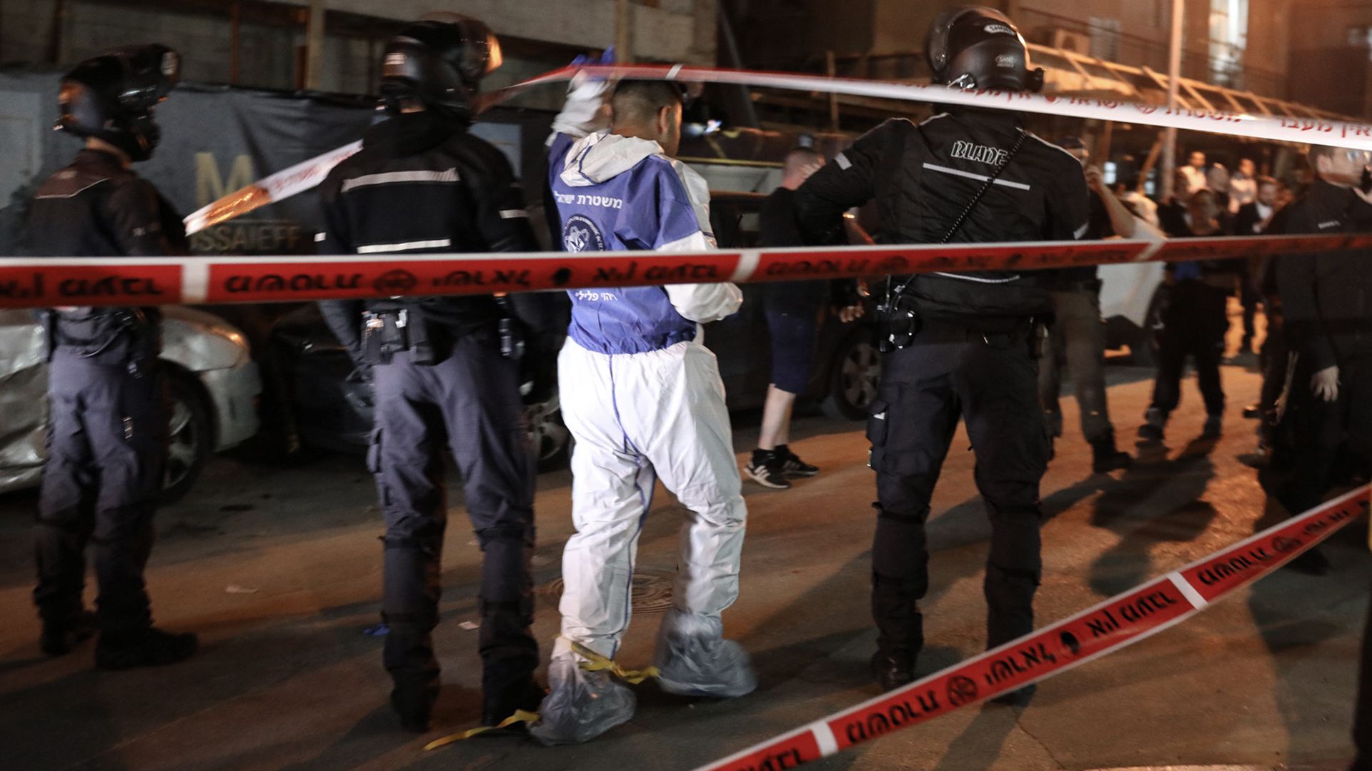 Security forces stand at the scene of a shooting attack in Bnei Brak. Photo:  Ilia Yefimovich/picture alliance via Getty Images