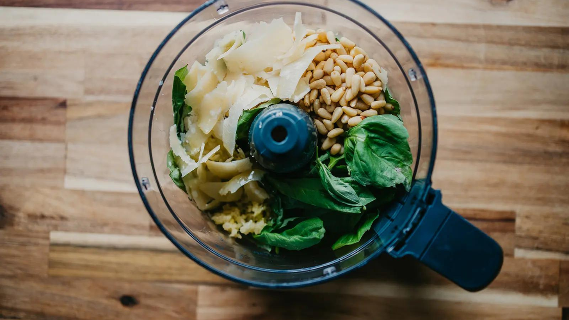 pesto ingredients in a food processor