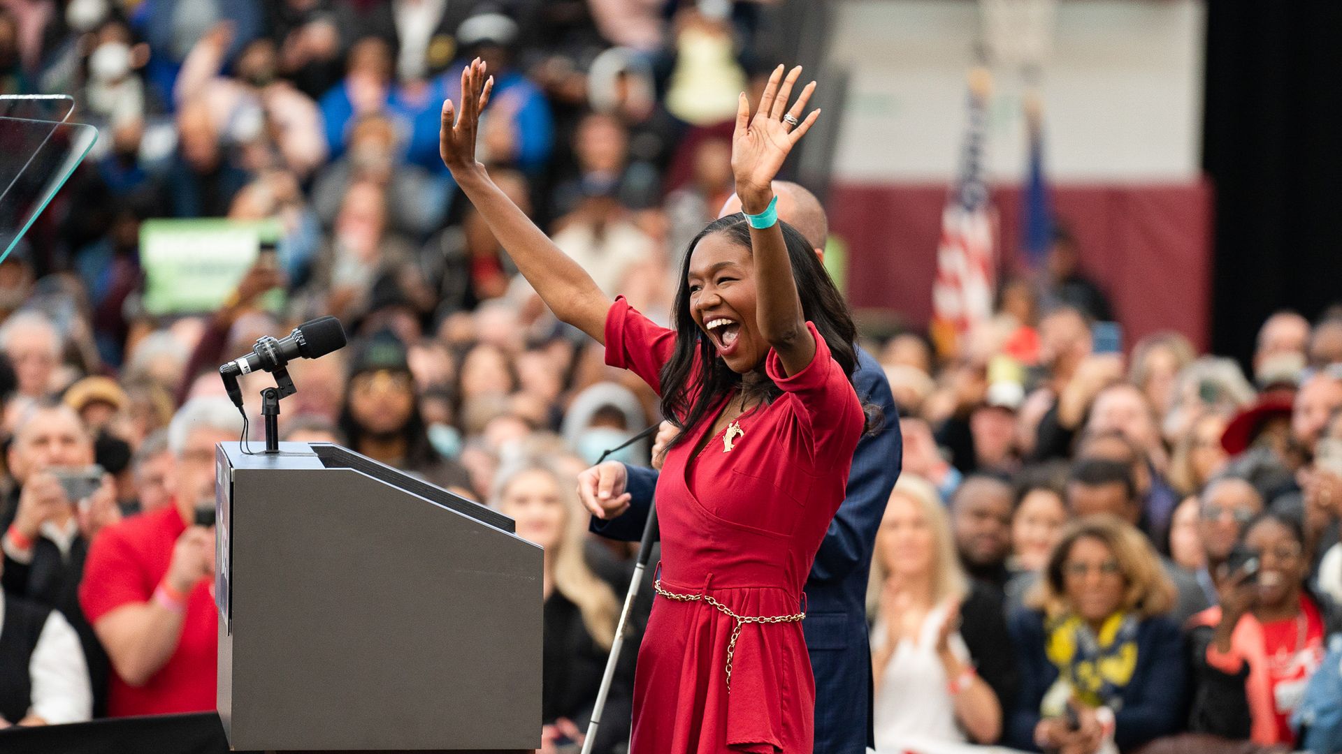 Kyra Harris Bolden waves to crowd at Renaissance High School