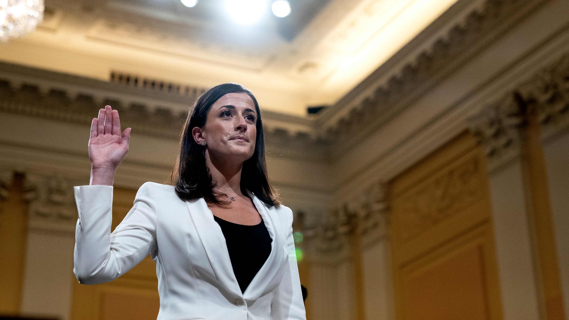 TOPSHOT - Cassidy Hutchinson, a top aide to former White House Chief of Staff Mark Meadows, is sworn in during the sixth hearing by the House Select Committee to Investigate the January 6th Attack on the US Capitol, in the Cannon House Office Building in Washington, DC, on June 28, 2022.