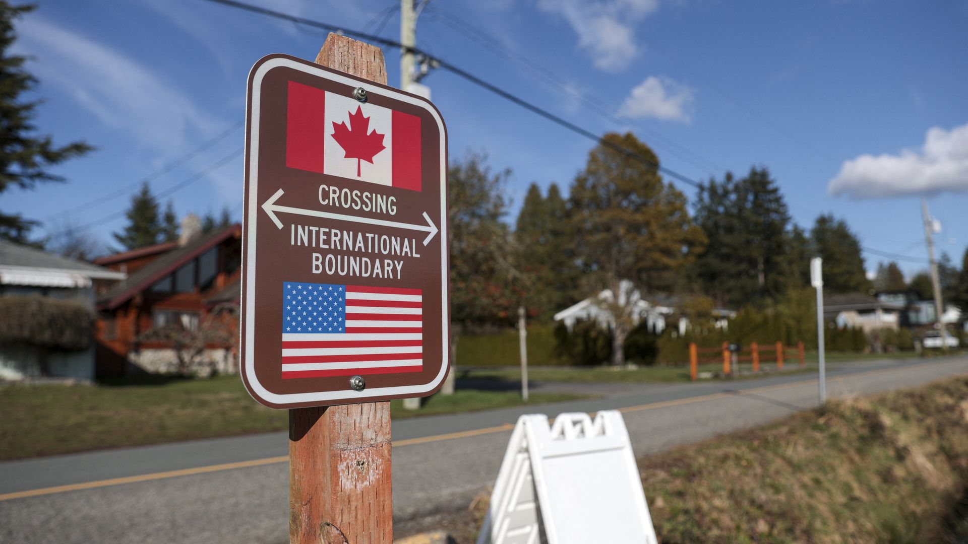 A sign showing the international boundary between the U.S. and Canada. 