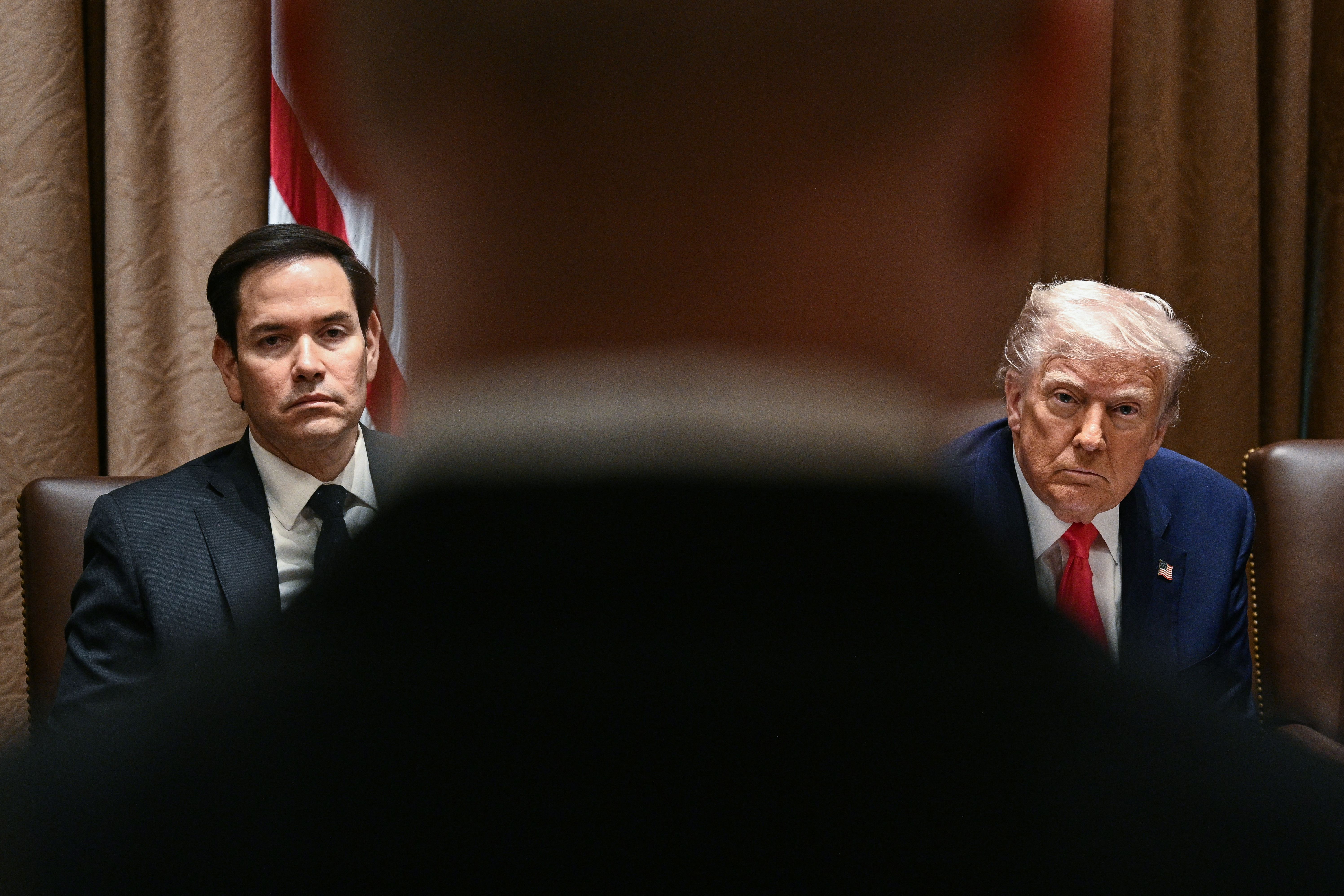 President Trump and Secretary of State Marco Rubio at a Cabinet meeting last month. 