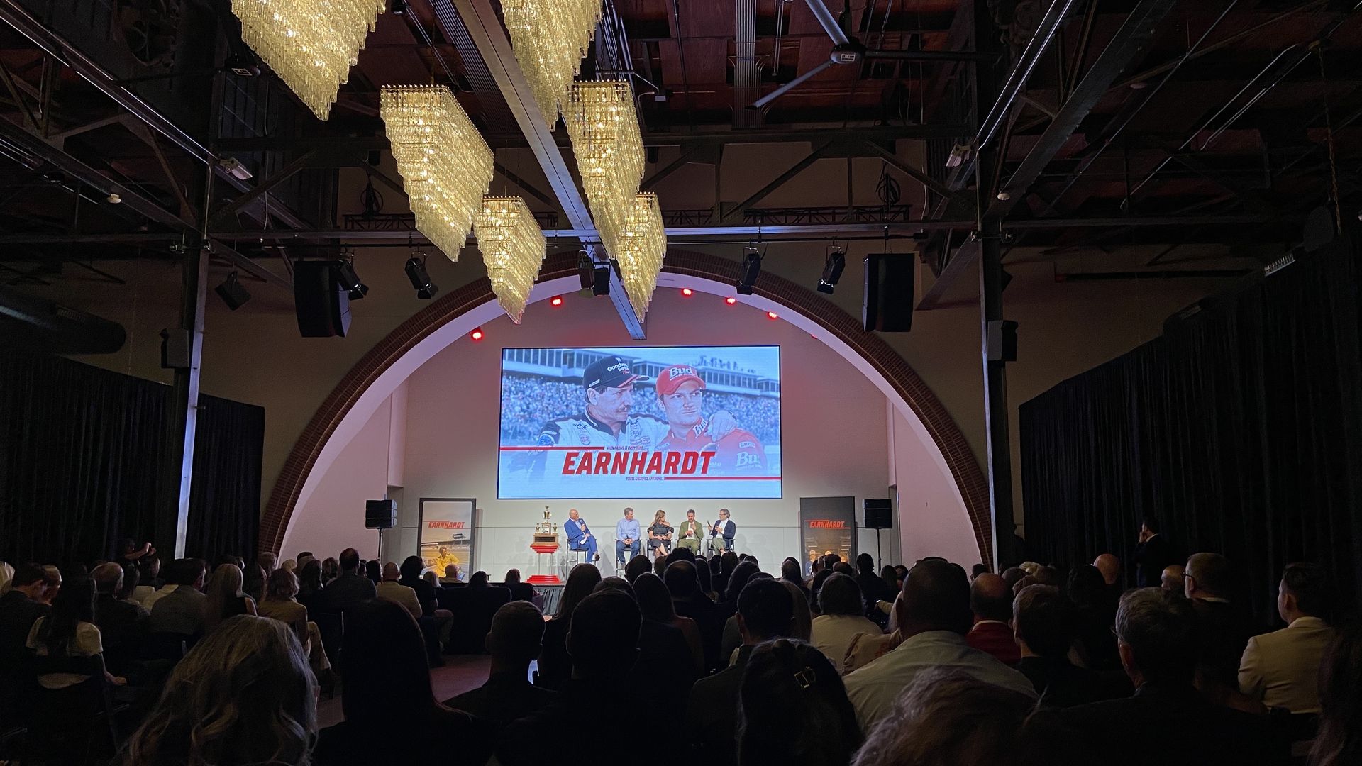 People sit in a room at The Revelry at Camp North End for the premiere of "Earnhardt." 