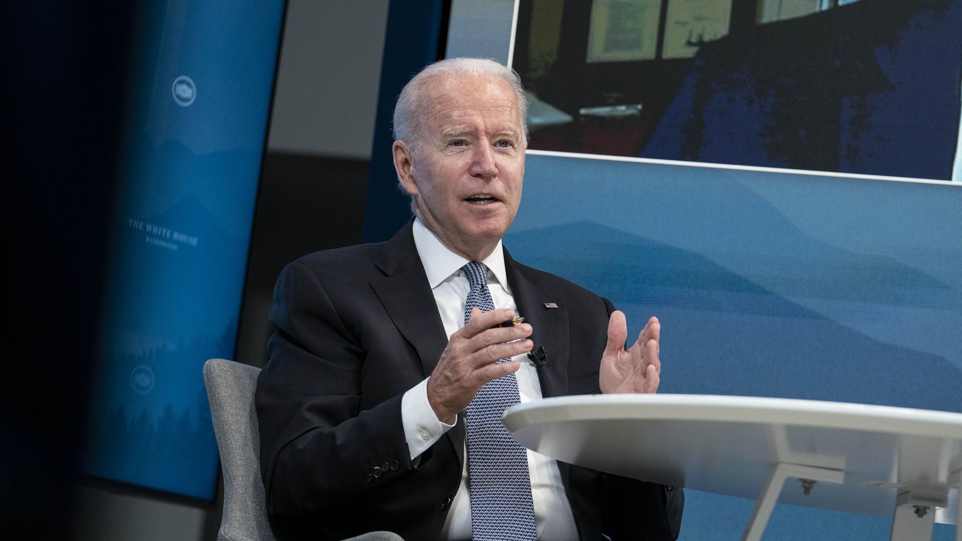 President Biden sits at desk