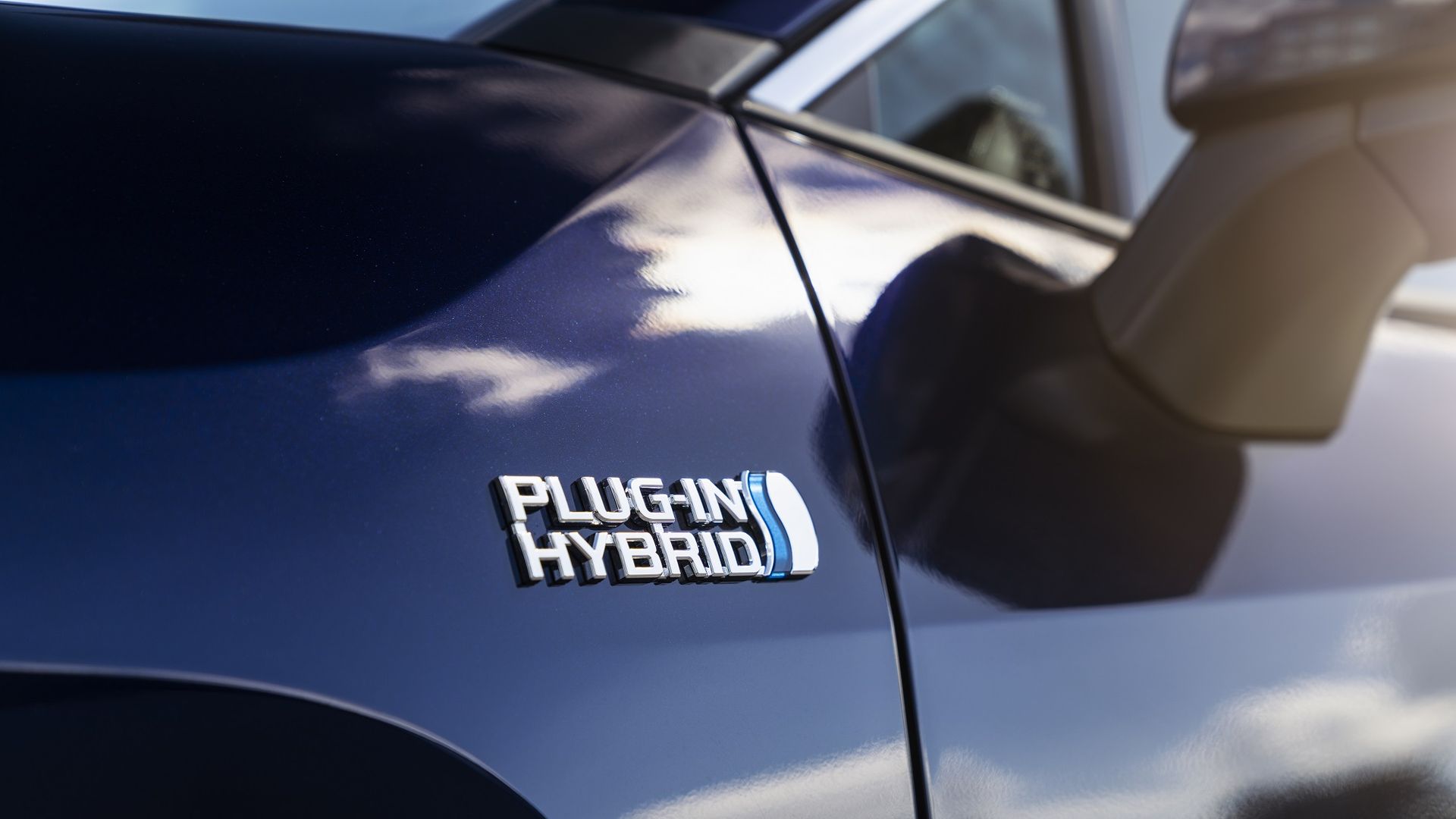 close-up of the words "Plug-in hybrid" on a 2021 Toyota Rav4 Prime