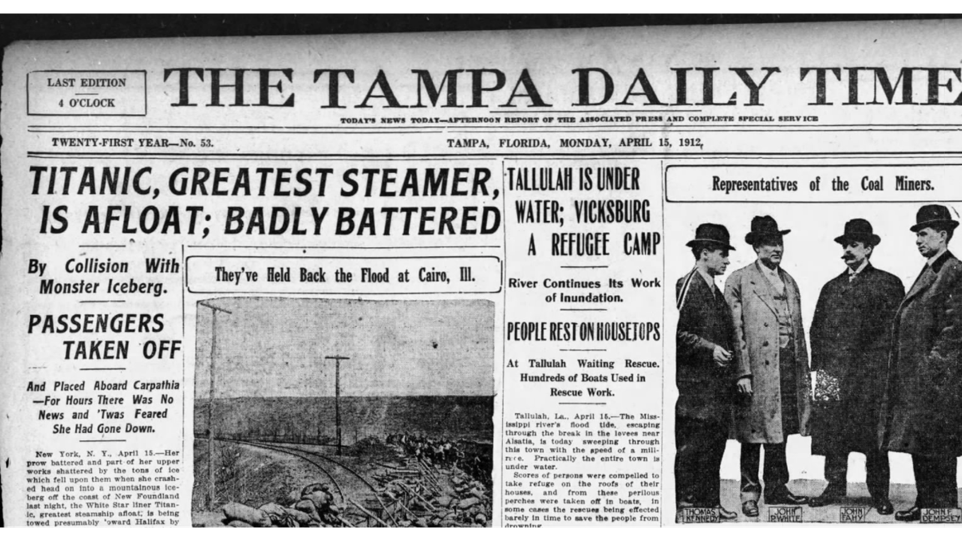 A newspaper clipping from the Tampa Daily Times with the headline "TITANIC, GREATEST STEAMER, IS AFLOAT; BADLY BATTERED"