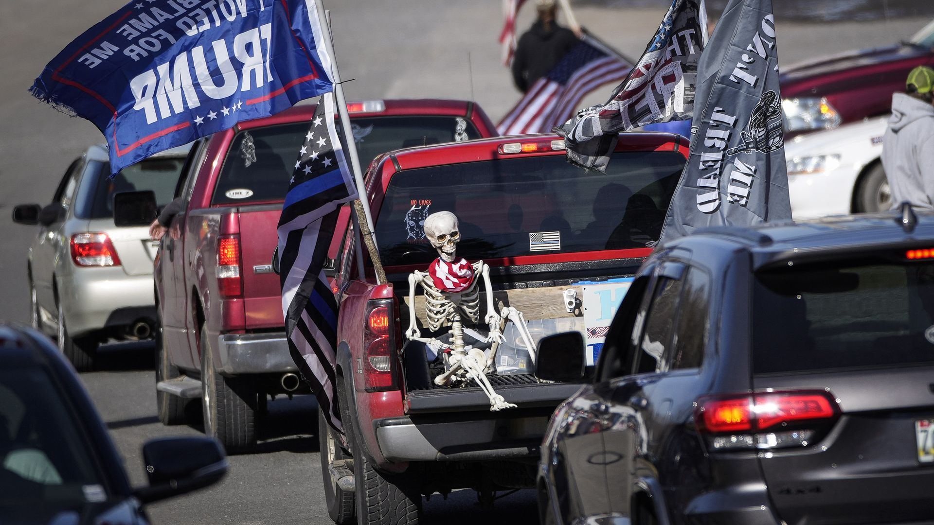 Vehicles arrive at the Hagerstown Speedway as they await the arrival of the Peoples Convoy of truckers on March 4, 2022 in Hagerstown, Maryland.