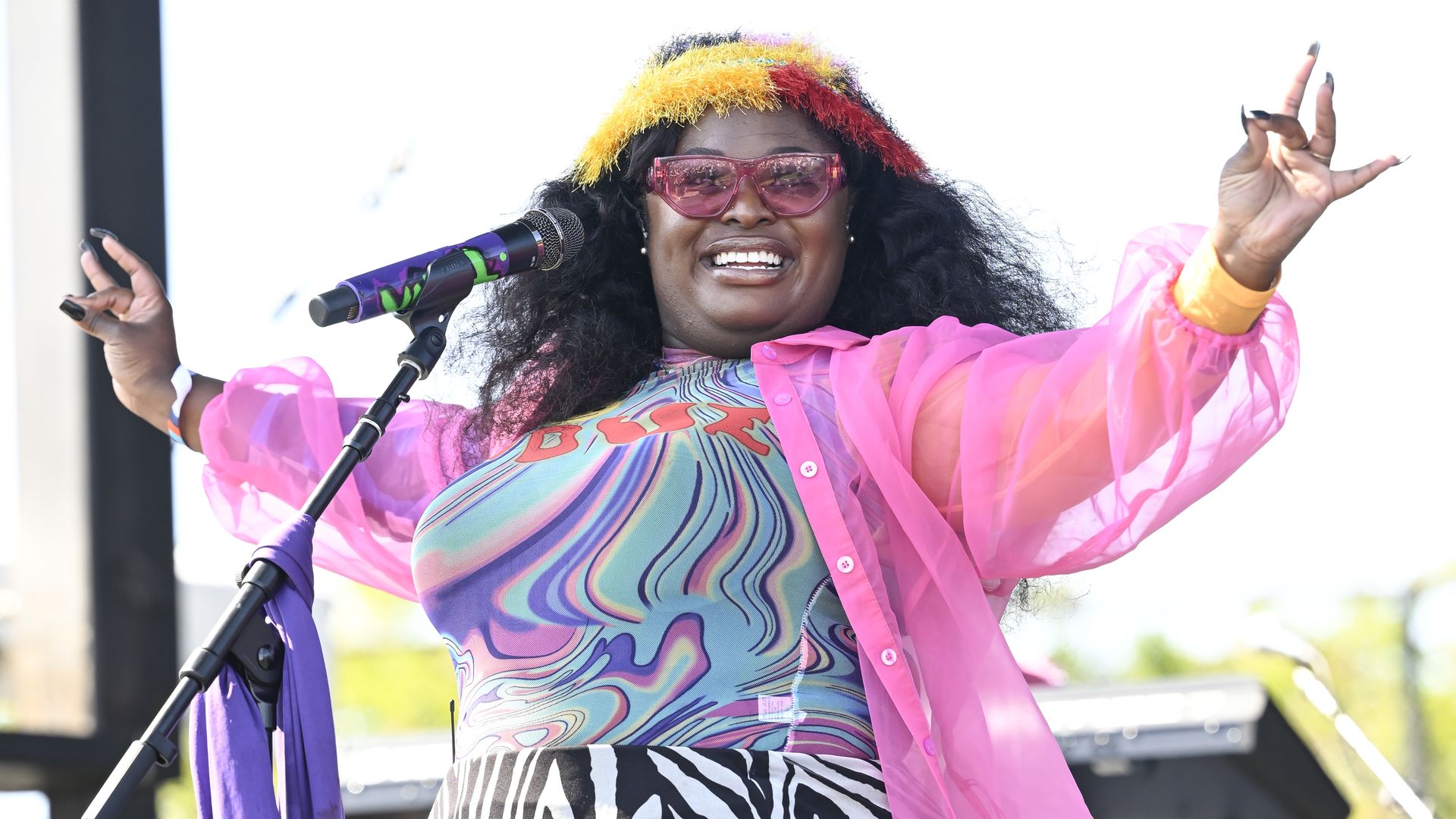 Photo shows Tarriona "Tank" Ball performing on stage