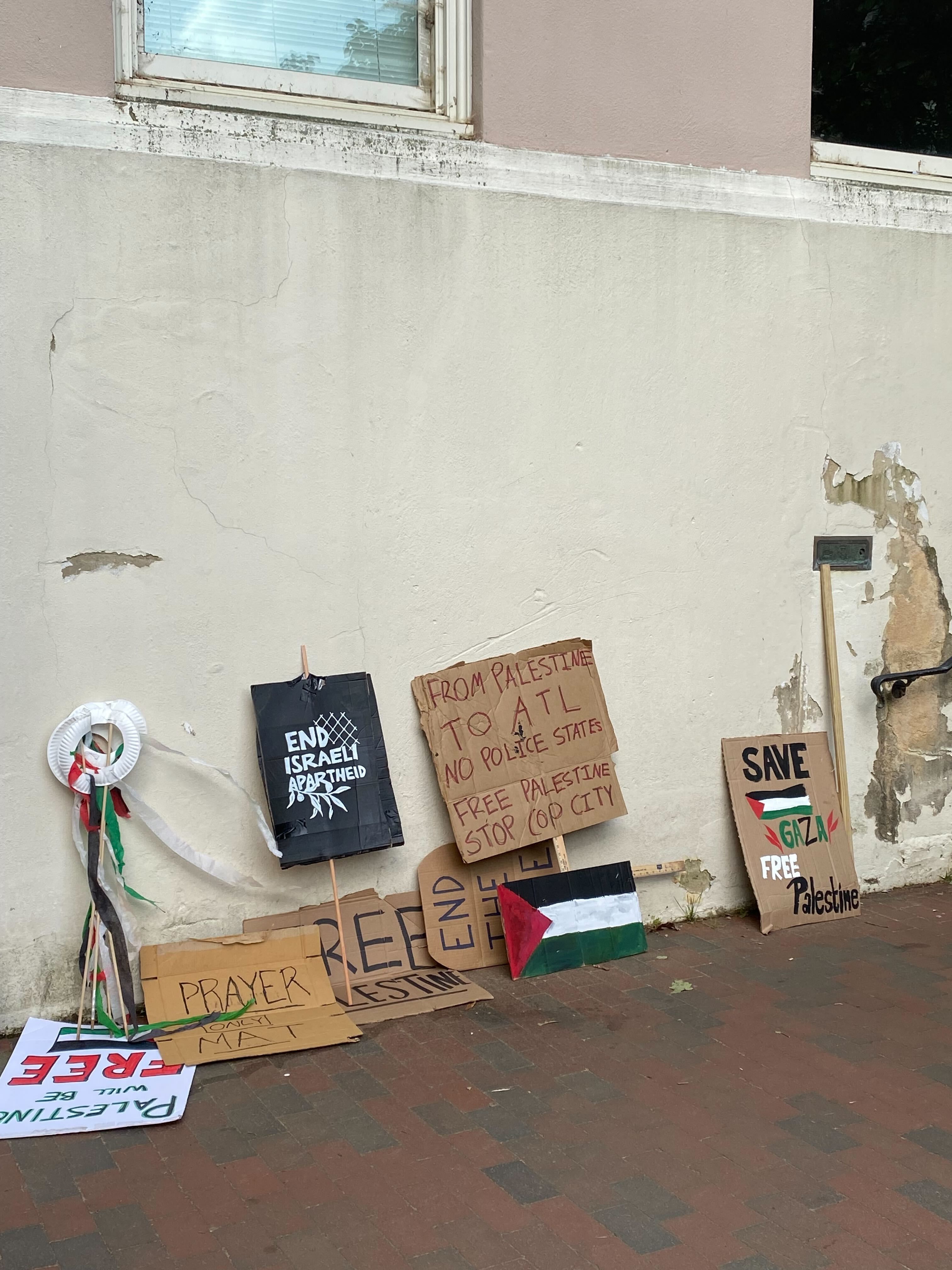 Signs left behind from an encampment