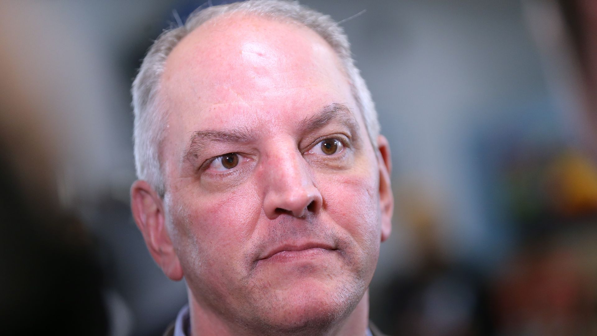 Gov. John Bel Edwards talks to media at the Case Closed Barbershop on November 15, 2019 in New Orleans