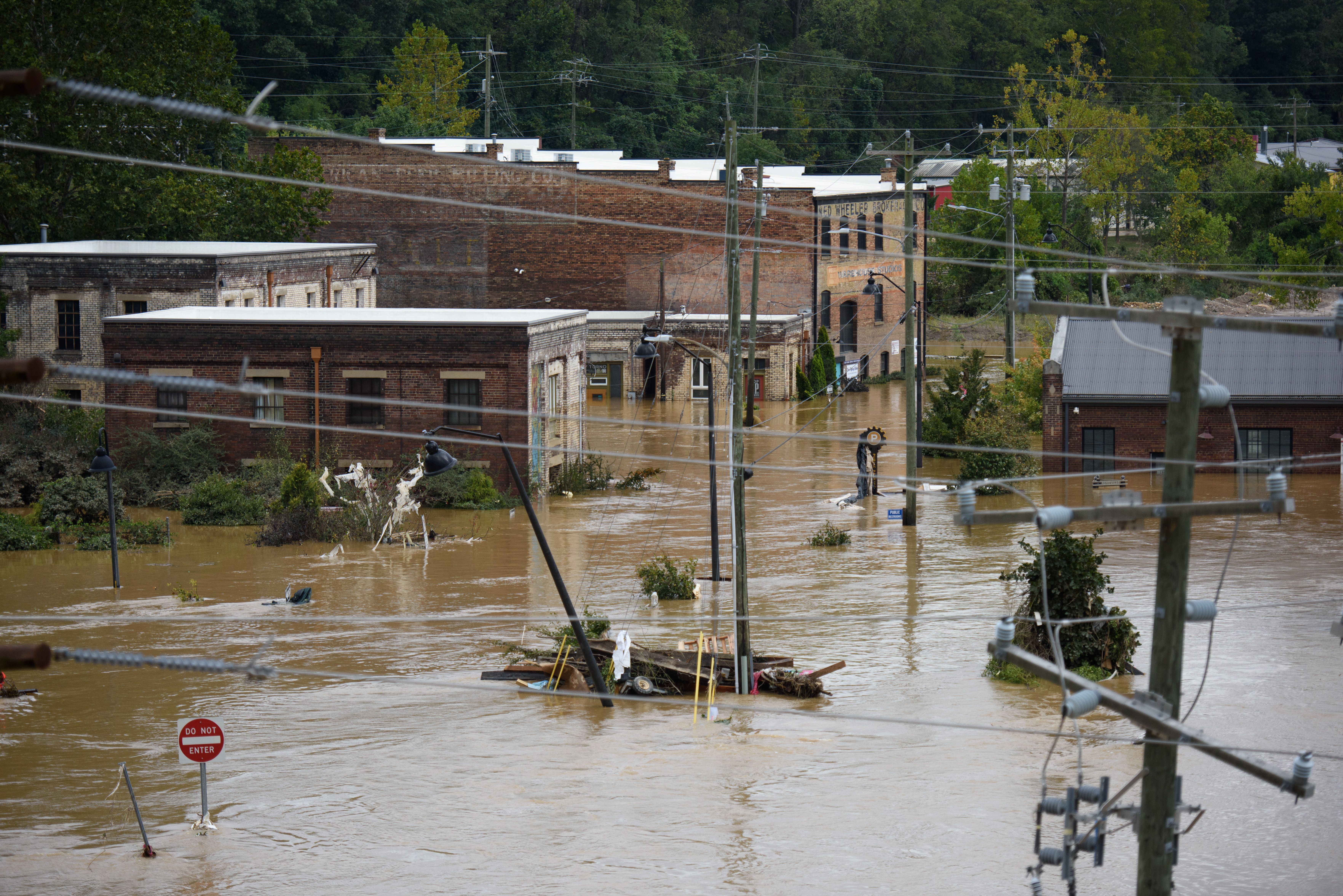 flooded street in Asheville after Tropical Storm Helene