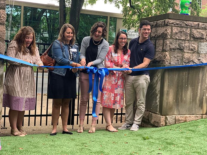 Playground ribbon cutting at church