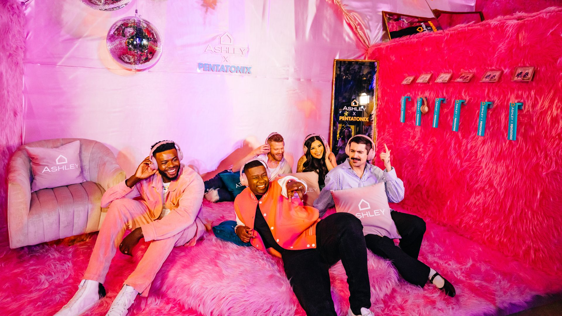 A capella quintent Pentatonix listen to their new album in a listening room.