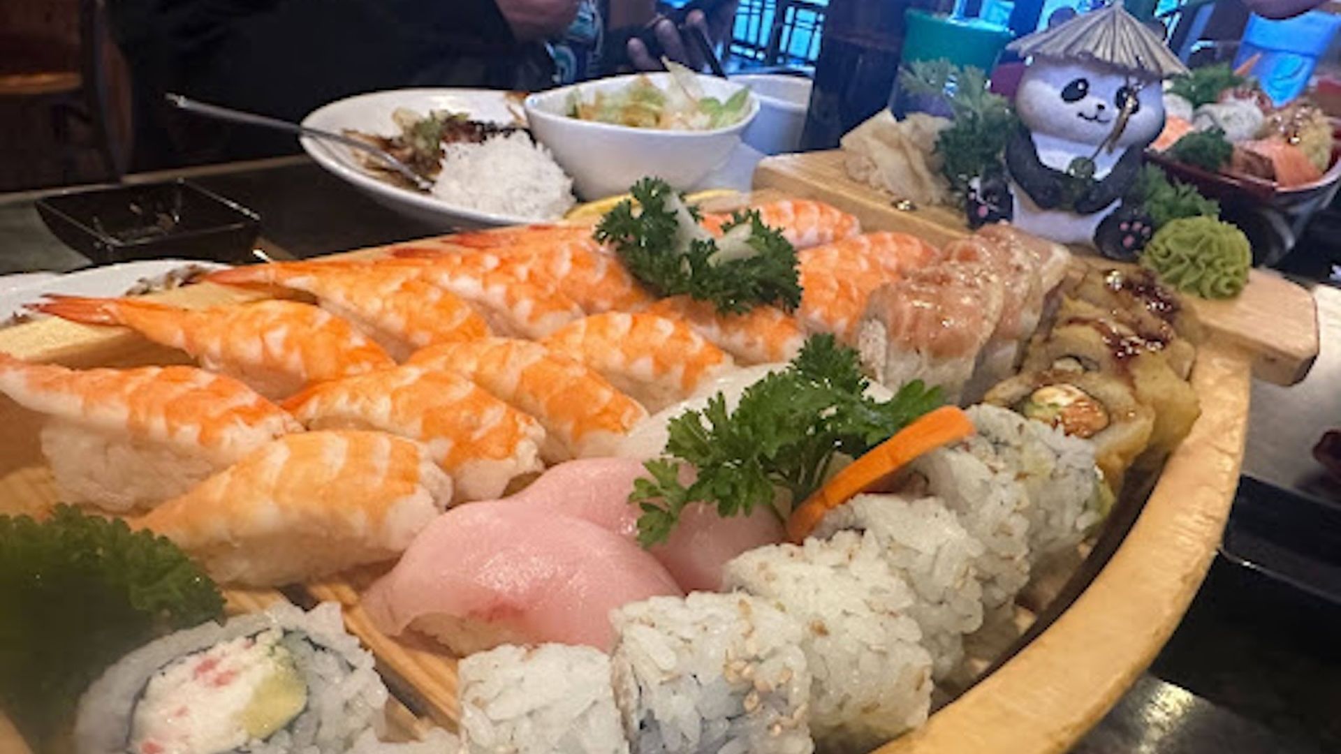 Sushi Ai’s sushi boat game is strong. Photo: Glenn Wallace/Axios