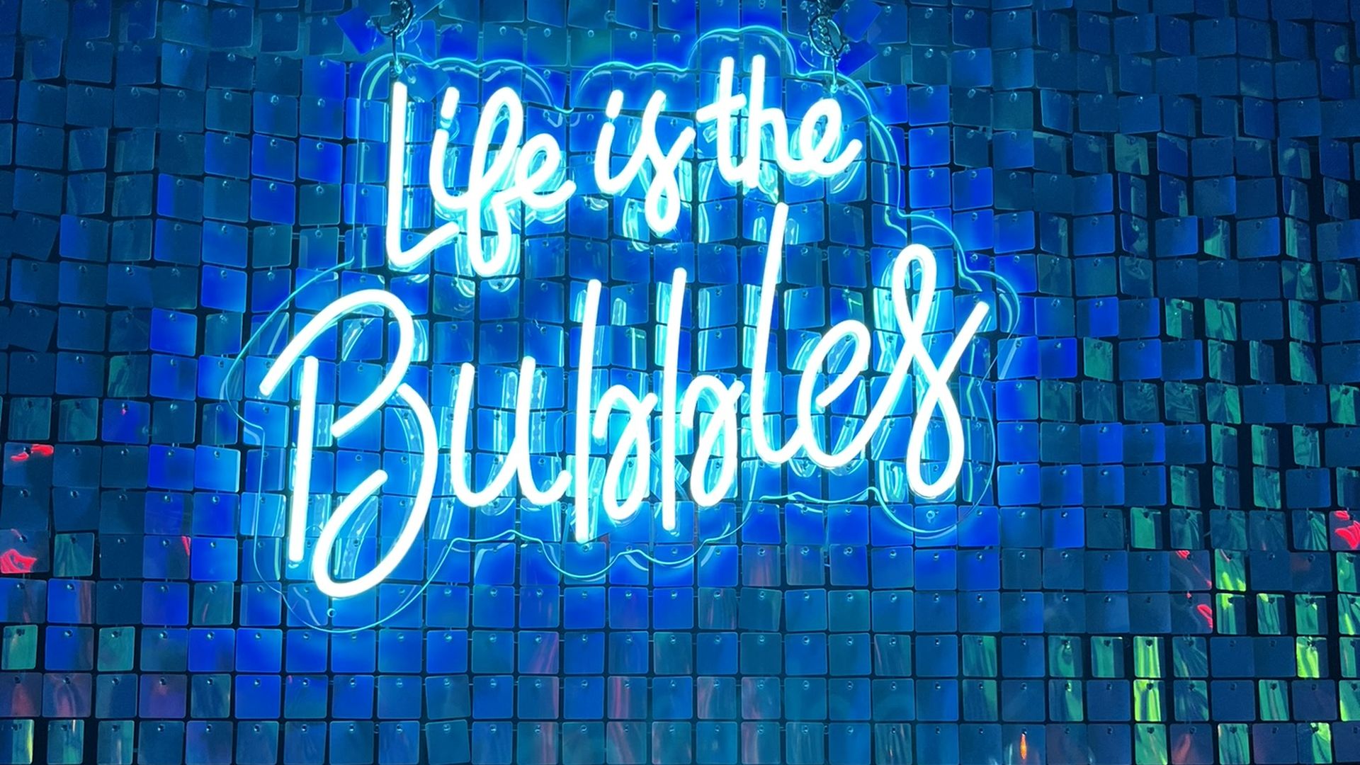 A neon sign that says, "Life is the bubbles" at Adventure Aquarium in Camden, New Jersey.