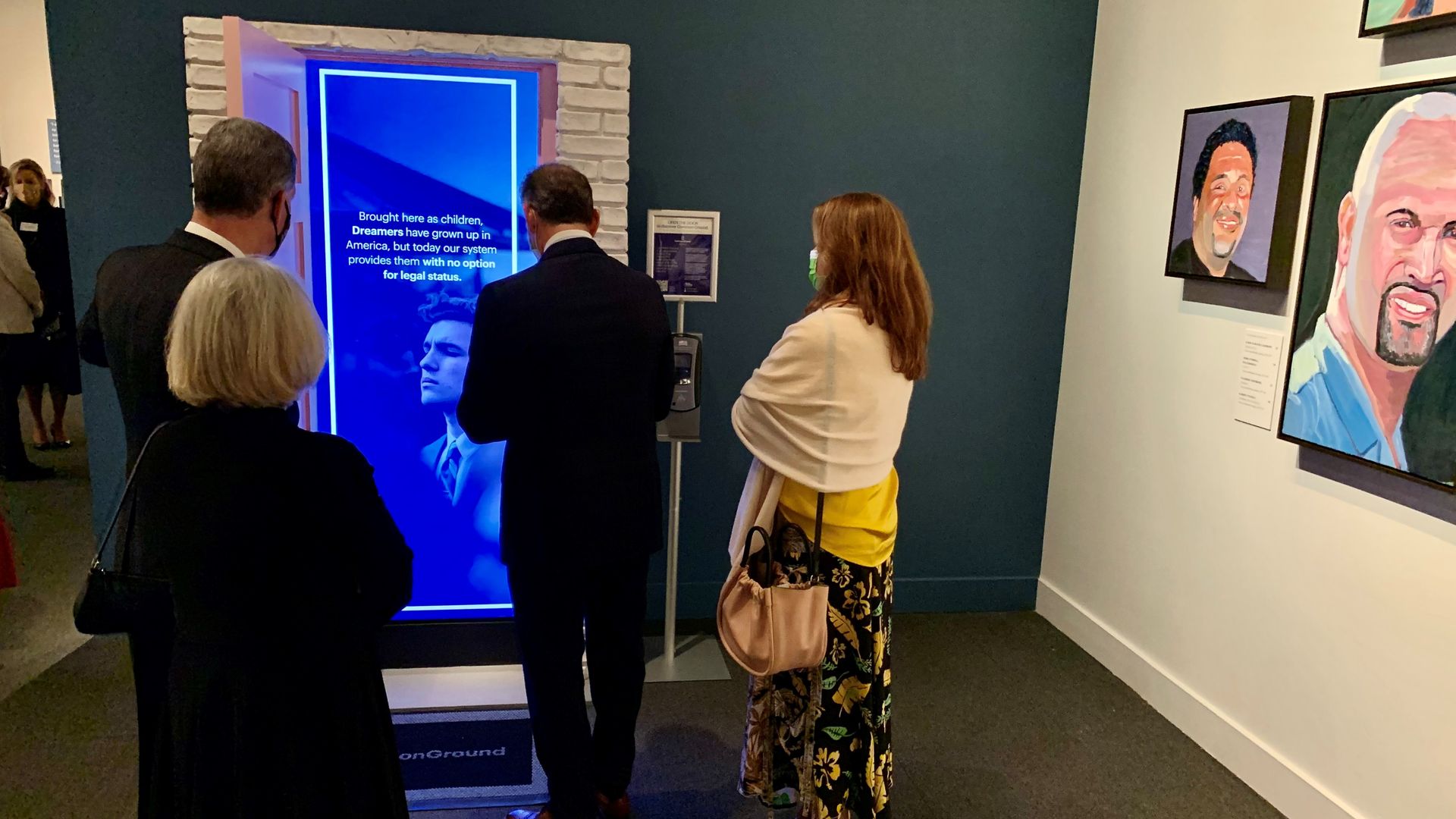Visitors at the at the George W. Bush Presidential Center in Dallas, Texas, check out an immigration interactive exhibit.