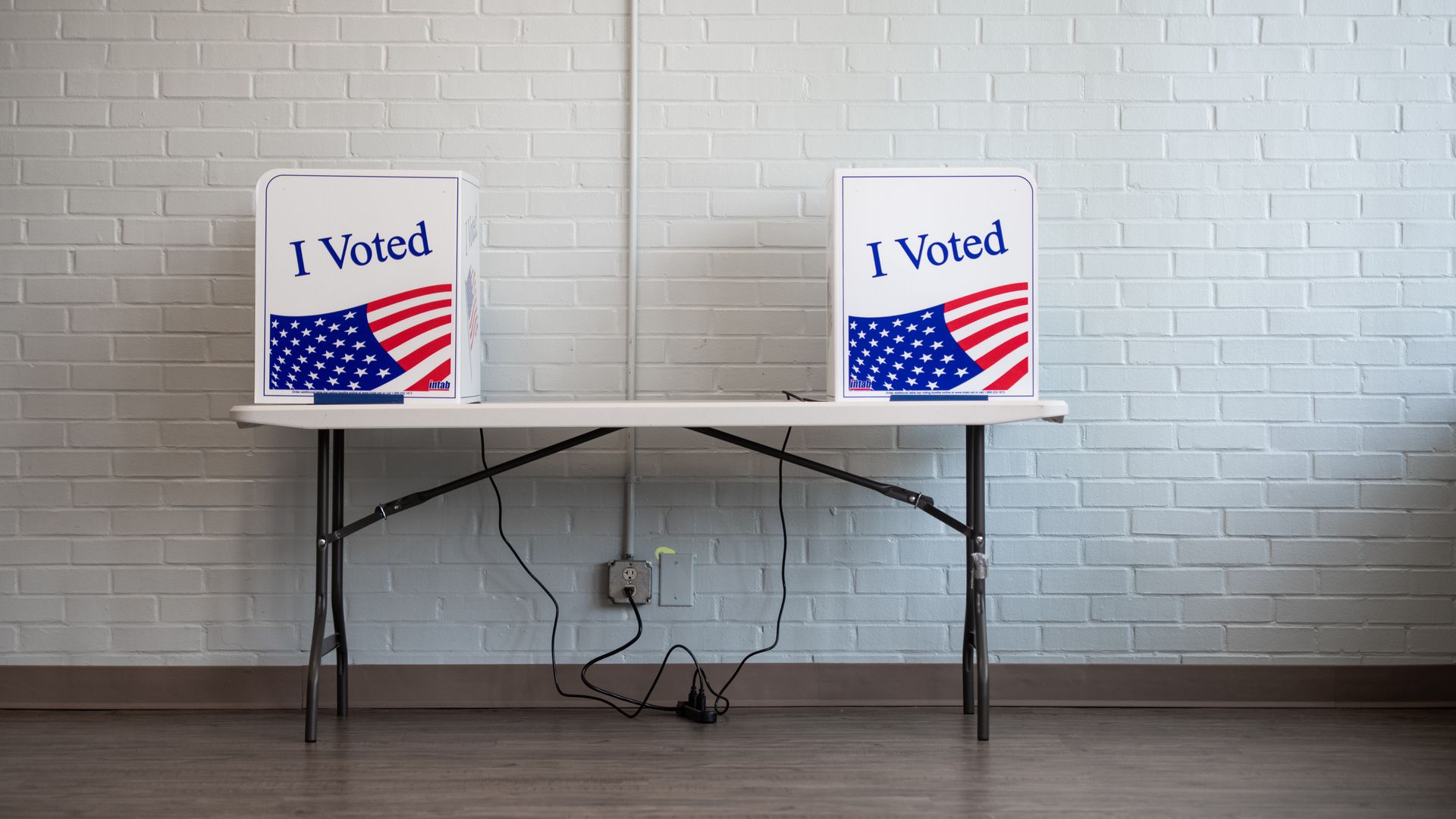 Voting machines are shown. 