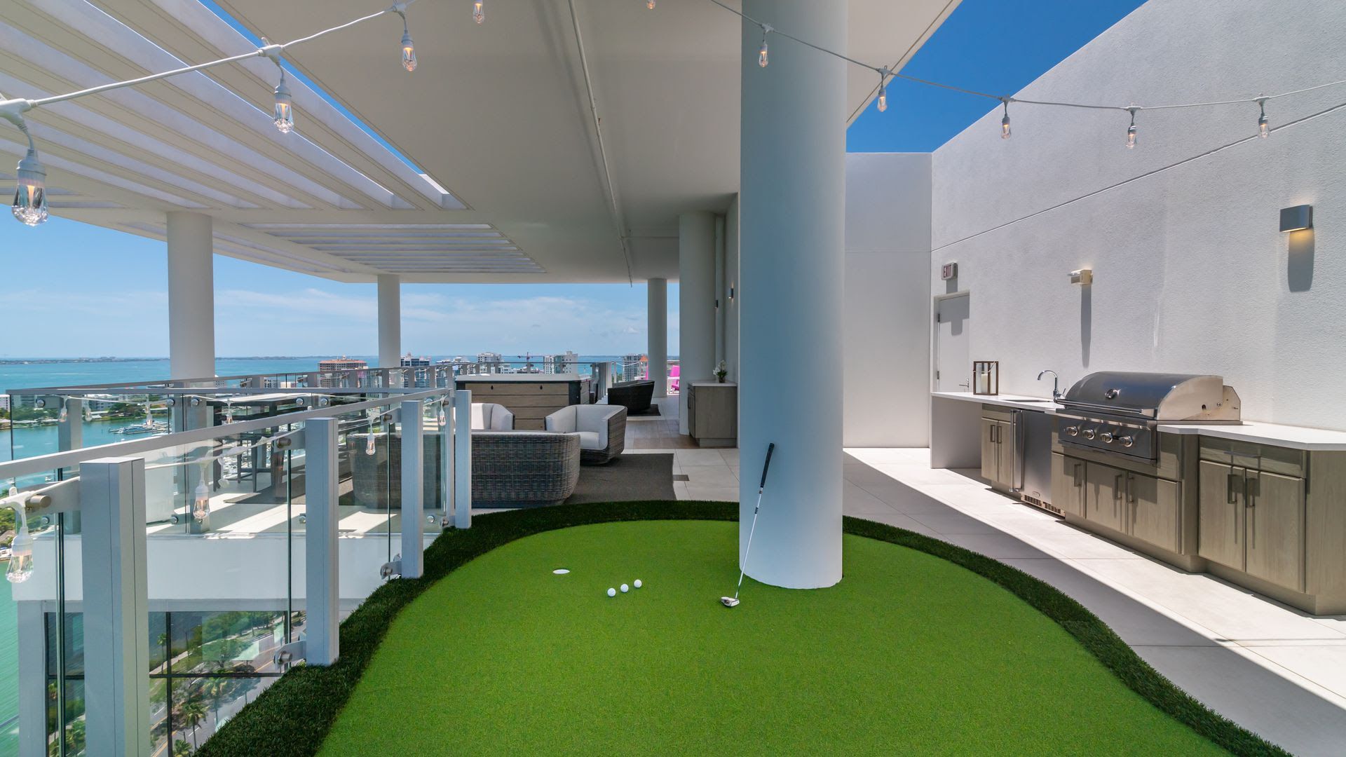 A photo of a rooftop putting green at a residence for sale in Sarasota, Florida, for $16 million.