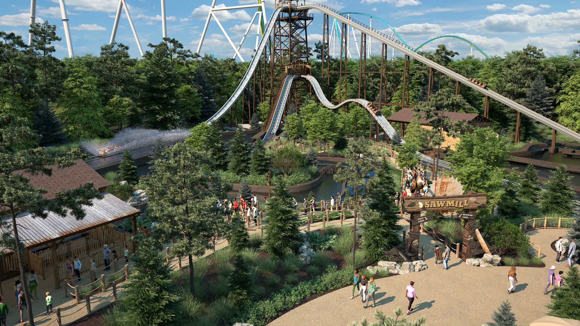 Panoramic view of a forest park with a large wooden/steel roller coaster, white supports, blue sky, and a crowd along paths near a rustic sawmill sign.