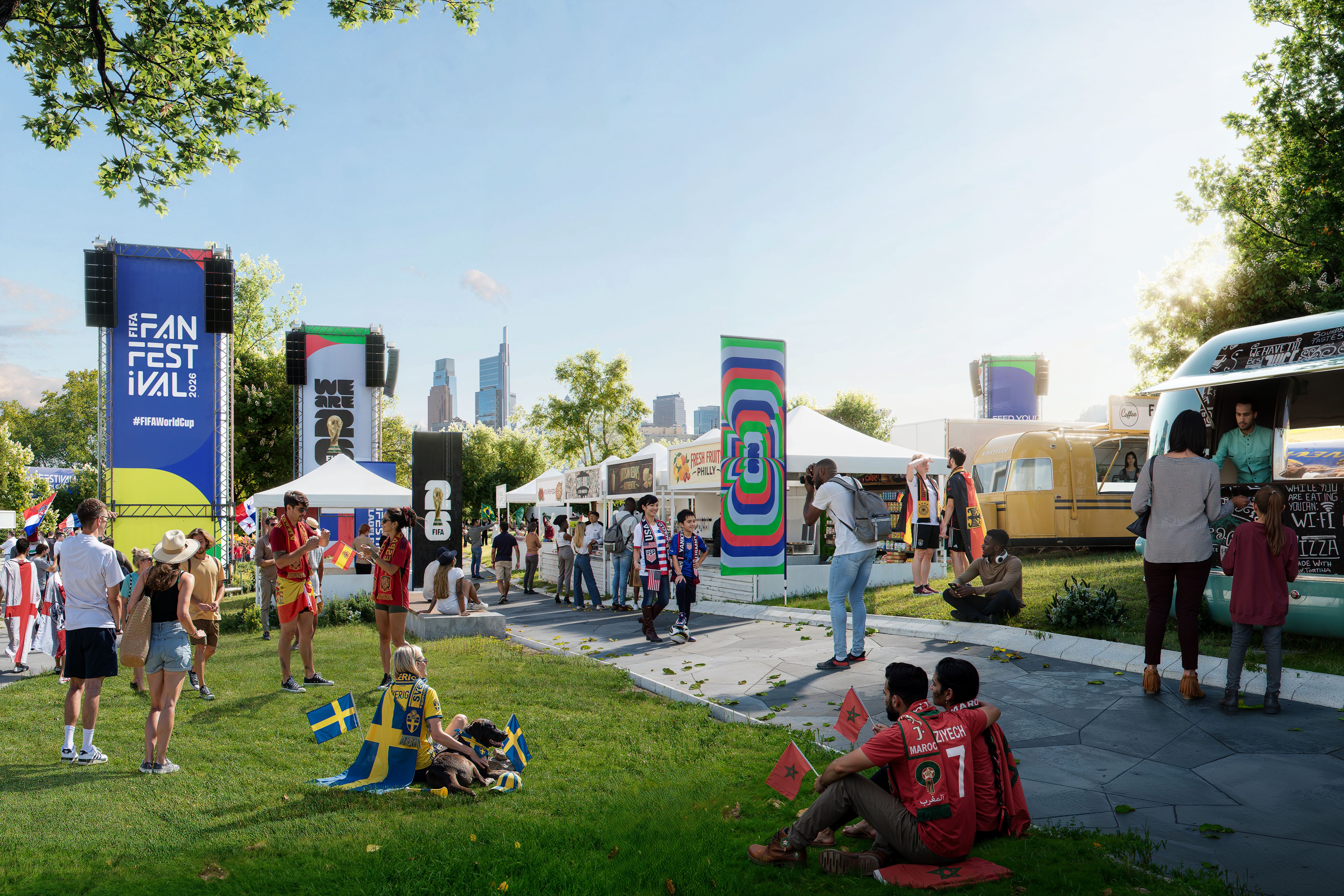 Outdoor festival with tall blue FIFA Fan Fest banners, white tents, and food trucks. Crowd mingles on a sunny day; flags and jerseys amid a colorful striped pole, city skyline in the background.