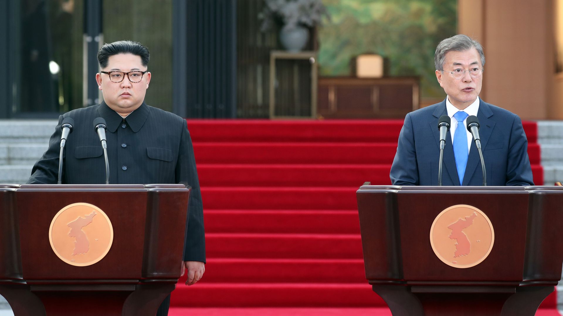 Kim Jong-un and Moon Jae-in look bored.