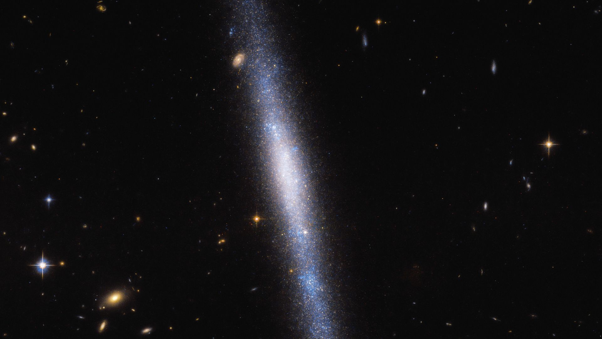 A galaxy that looks very much like a waterfall in deep space