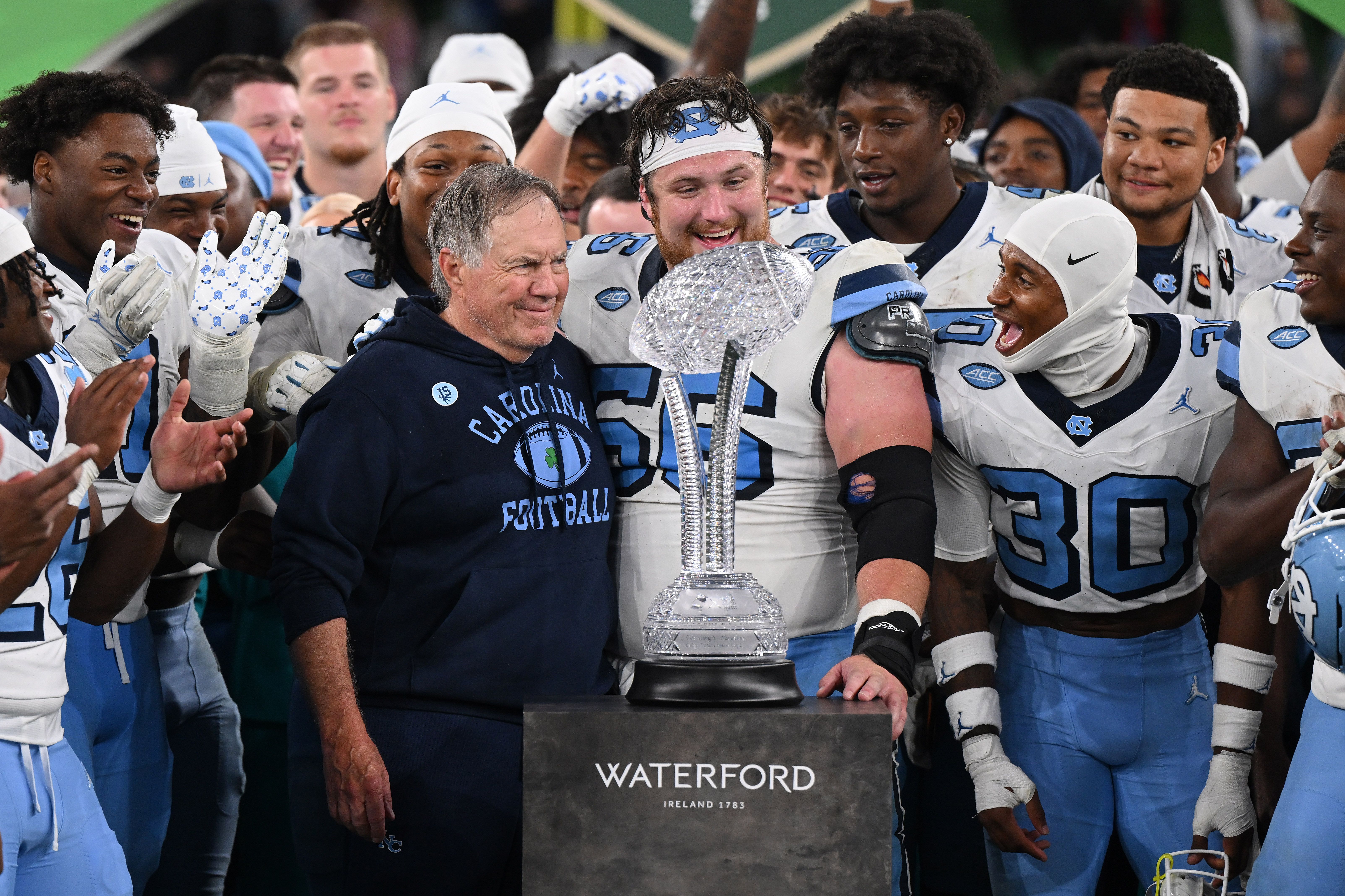 Bill Belichick, head coach of the University of North Carolina Tar Heels is pictured celebrating with his players following their victory over the TCU Horned Frogs in the Aer Lingus College Football Classic at Aviva Stadium on August 29, 2026 in Dublin, Ireland. (Photo by Charles McQuillan/Getty Im