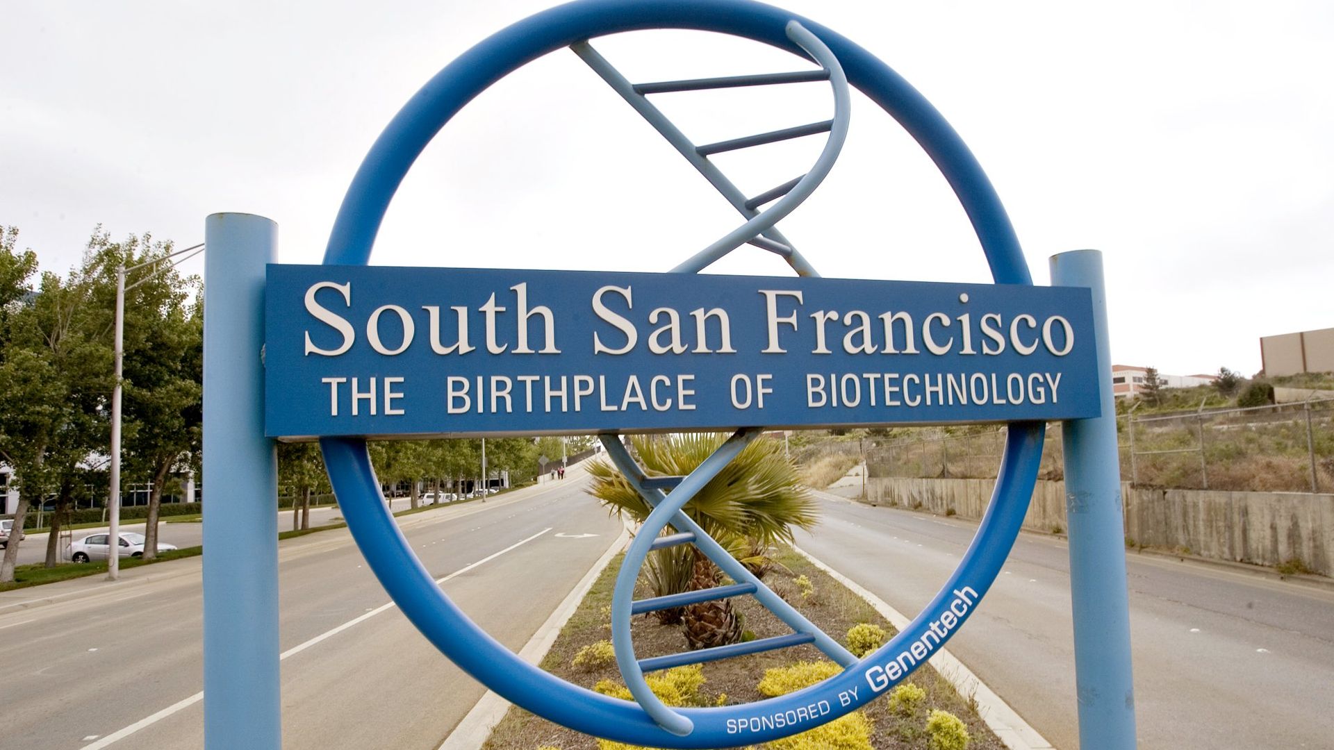 Photo of a sign with a DNA curvature in the middle that says "South San Francisco: The birthplace of biotechnology"