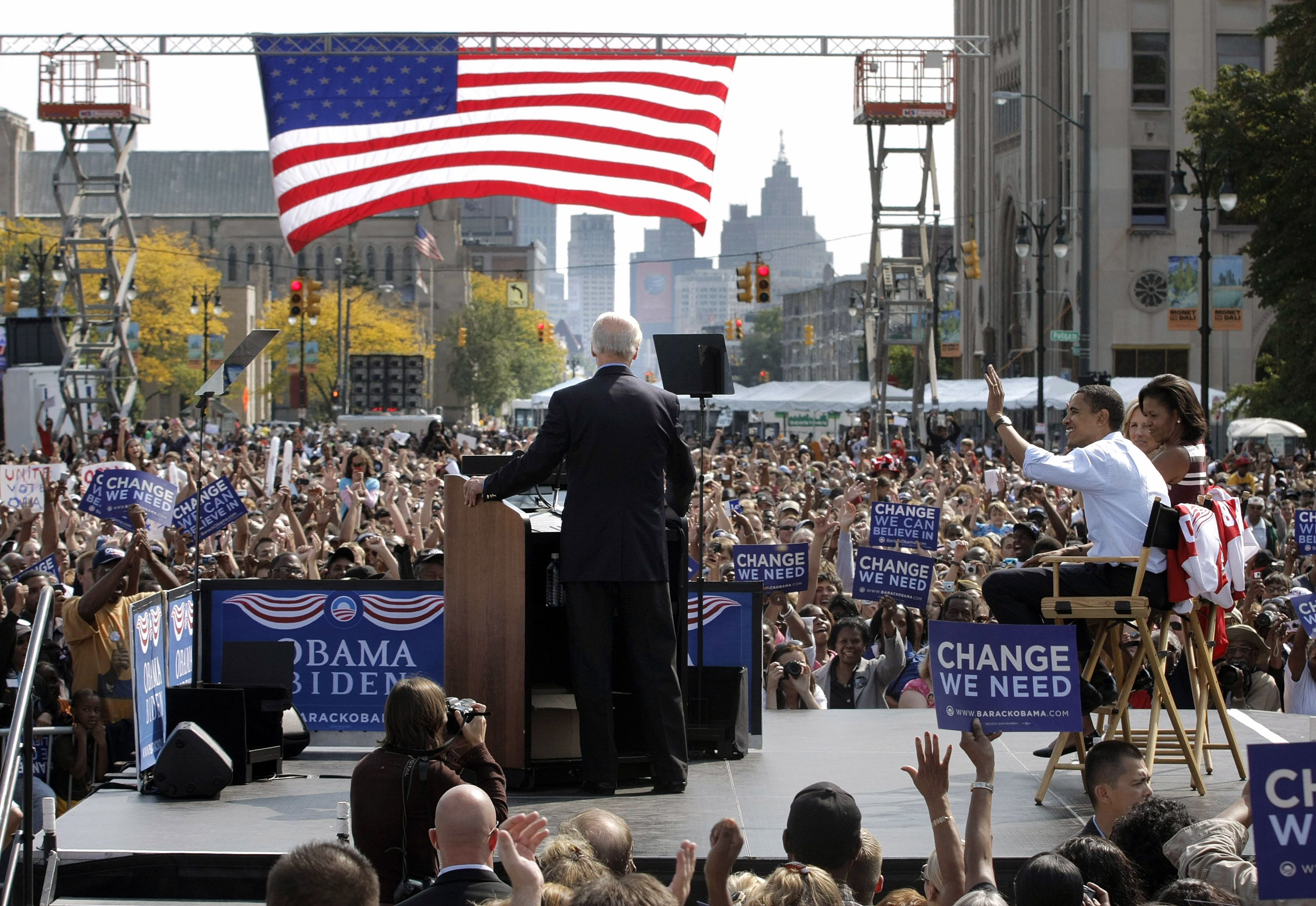 Then Democratic vice-presidential nominee Sen. Joseph Biden speaks while his running mate Democratic Presidential nominee Sen. Barack Obama (D-IL), Obama's wife Michelle, and Biden's wife Jill attend a rally September 28, 2008 in Detroit, Michigan. Photo: Bill Pugliano/Getty Images