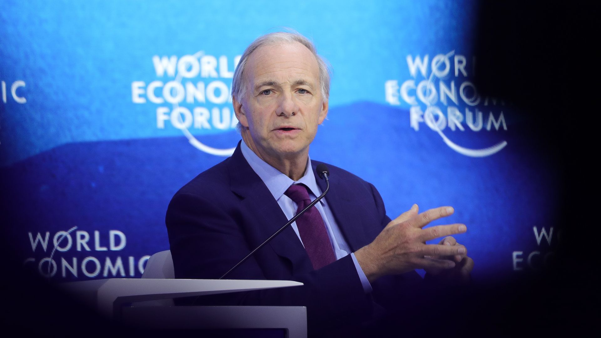 Co-Chairman and Co-Chief Investment Officer of Bridgewater Associates Ray Dalio attends a session during the World Economic Forum.