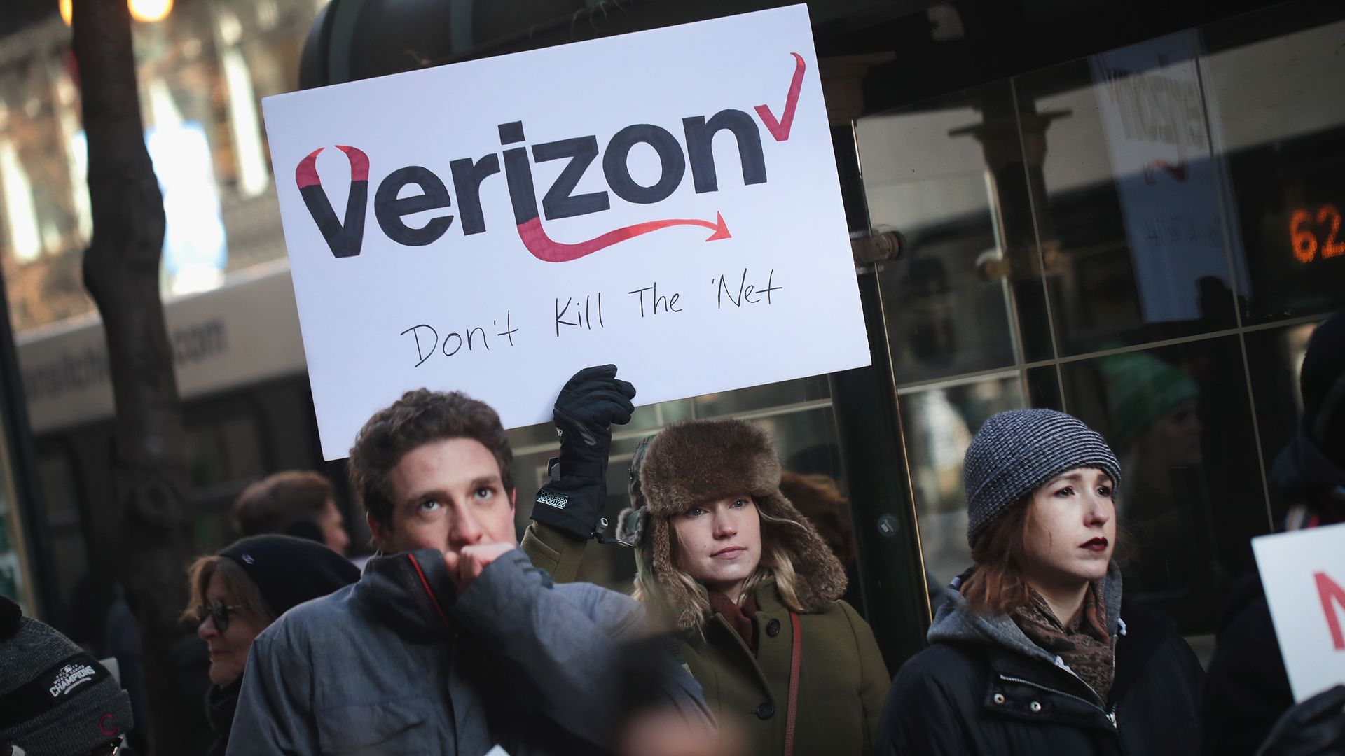 Protesters rally in Chicago in support of net neutrality. 