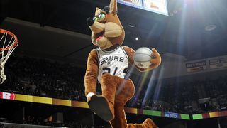 Coyote, the Spurs mascot, prepares to dive.