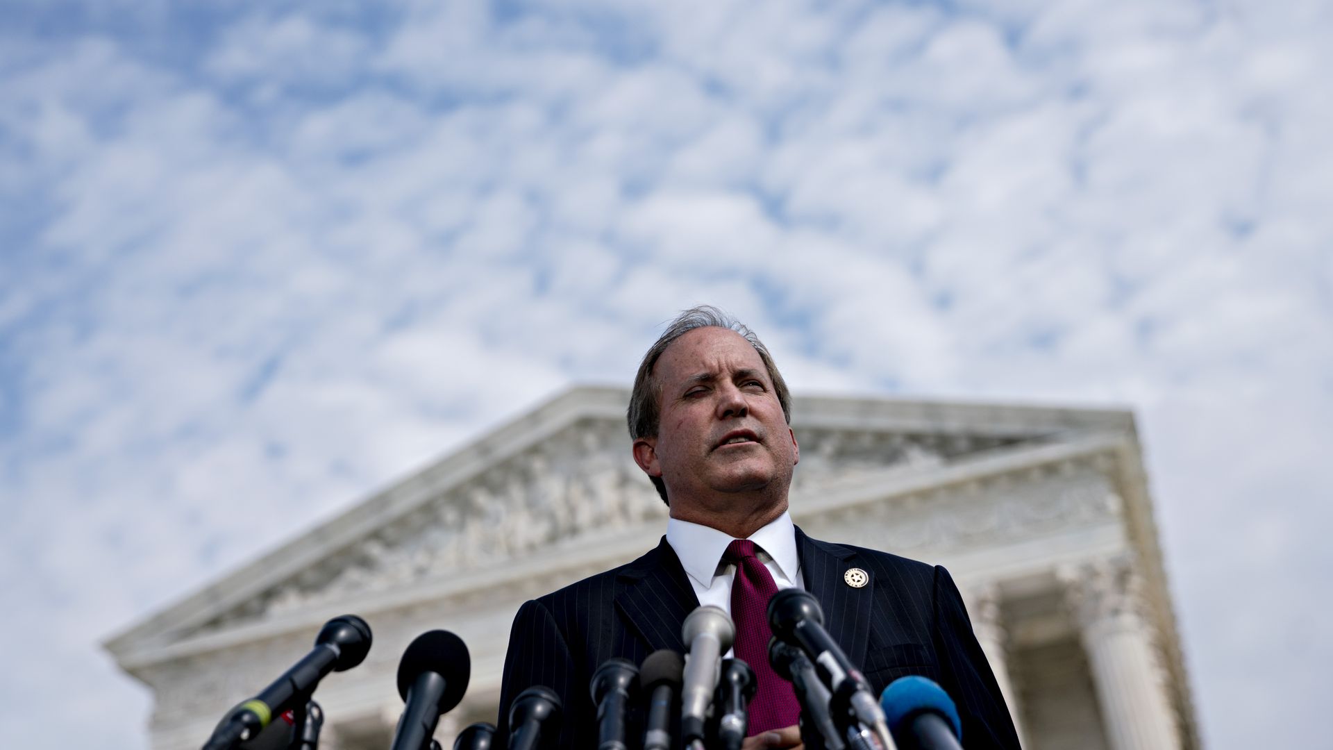 Ken Paxton, Texas attorney general, speaks during a news conference outside the Supreme Court in Washington, D.C., U.S., on Monday, Sept. 9, 2019. A group of 50 attorneys general opened a broad investigation into whether advertising practices of Alphabet Inc.'s Google violate antitrust laws. Photogr