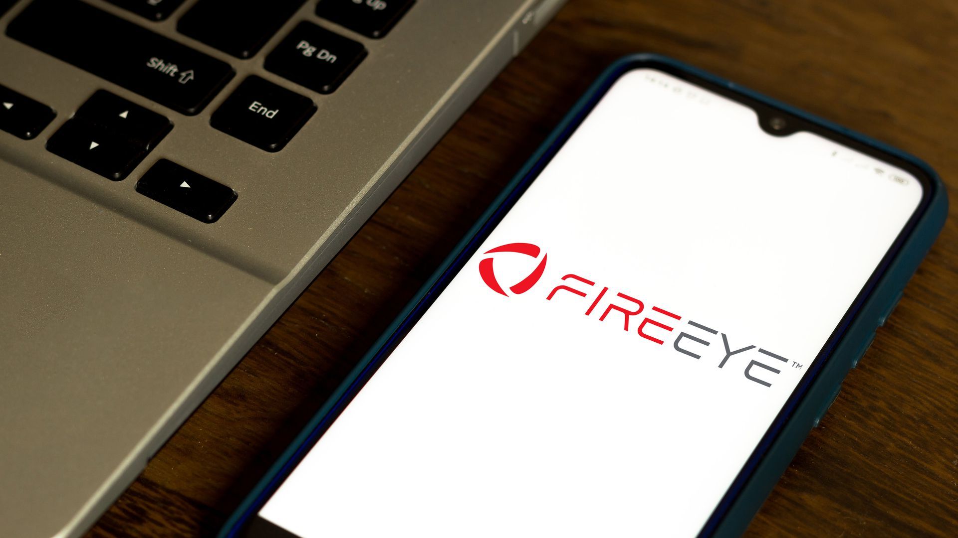 Image of a smartphone with FireEye logo