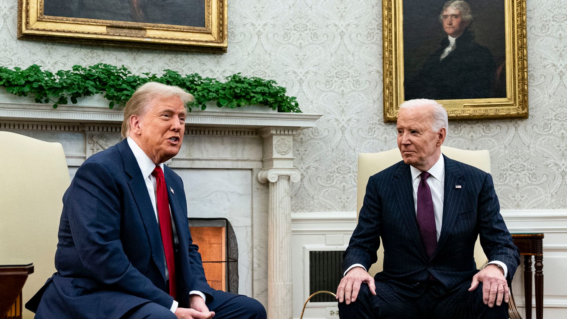 President-elect Trump and President Biden sit together in the Oval Office.