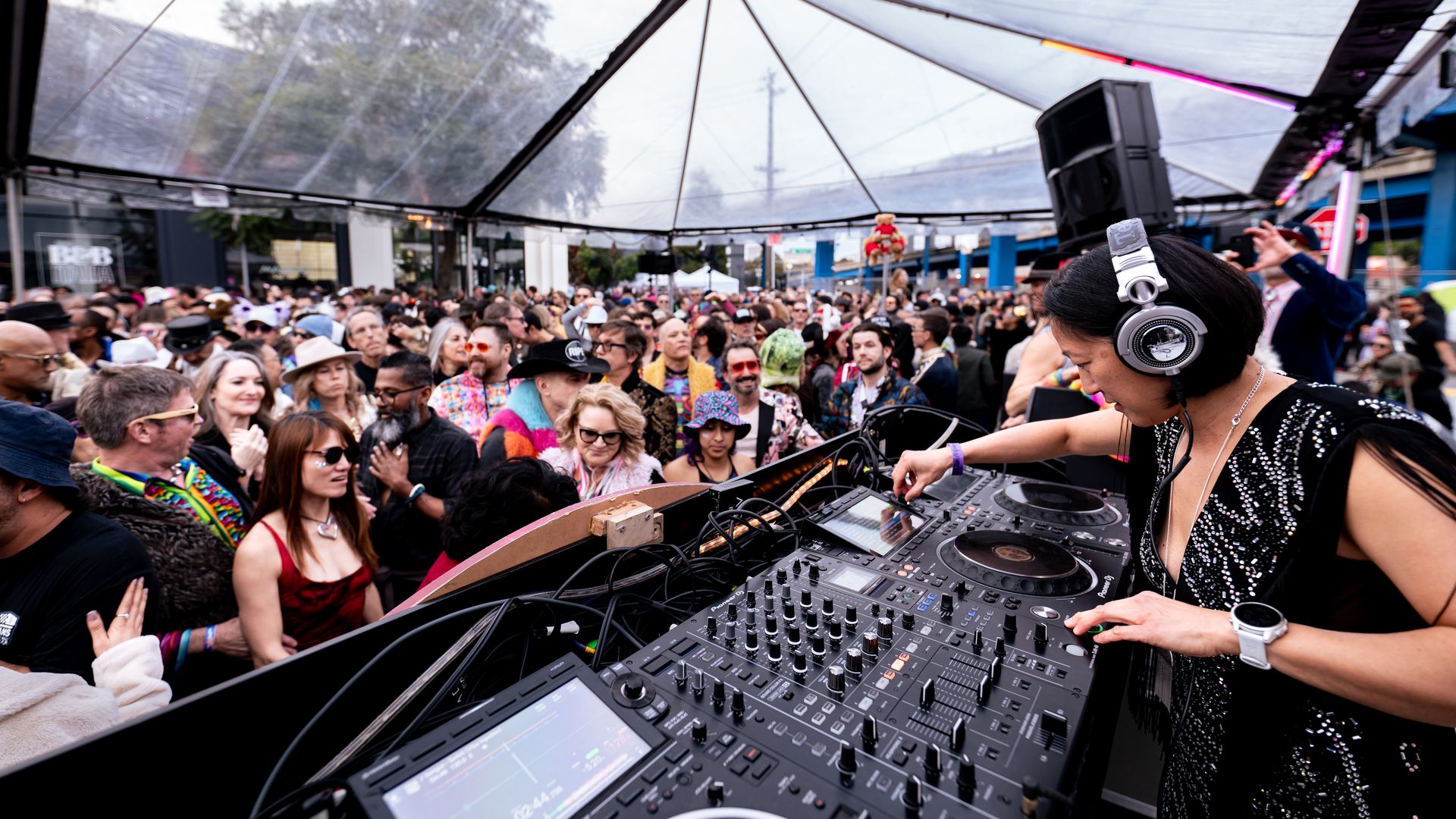 Jenny Shu aka DJ ShOOey DJing at Breakfast of Champions block party on New Years Day.