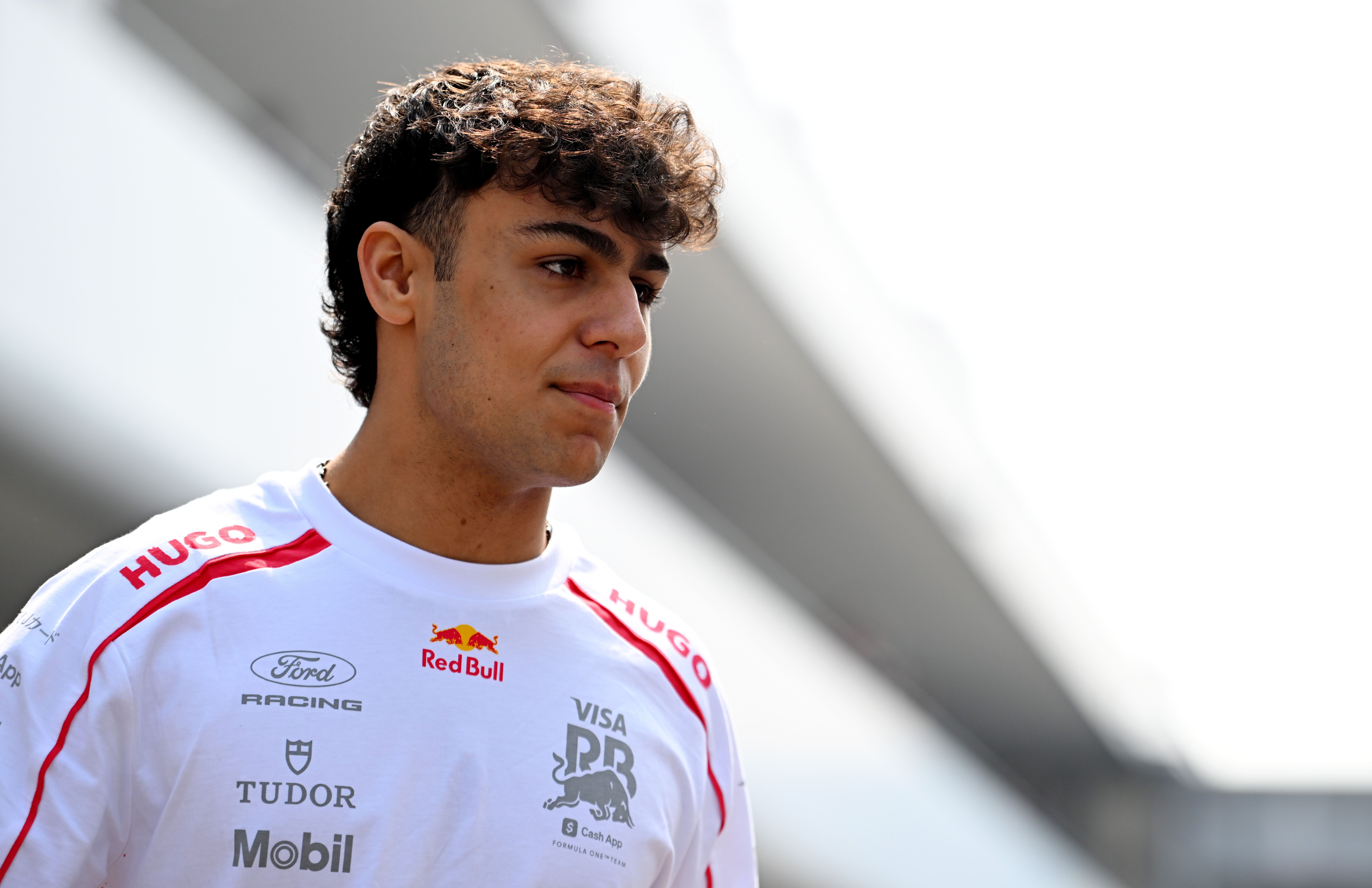 SUZUKA, JAPAN - MARCH 29: Arvid Lindblad of Great Britain and Visa Cash App Racing Bulls looks on prior to the F1 Grand Prix of Japan at Suzuka Circuit on March 29, 2026 in Suzuka, Japan. (Photo by Rudy Carezzevoli/Getty Images)
