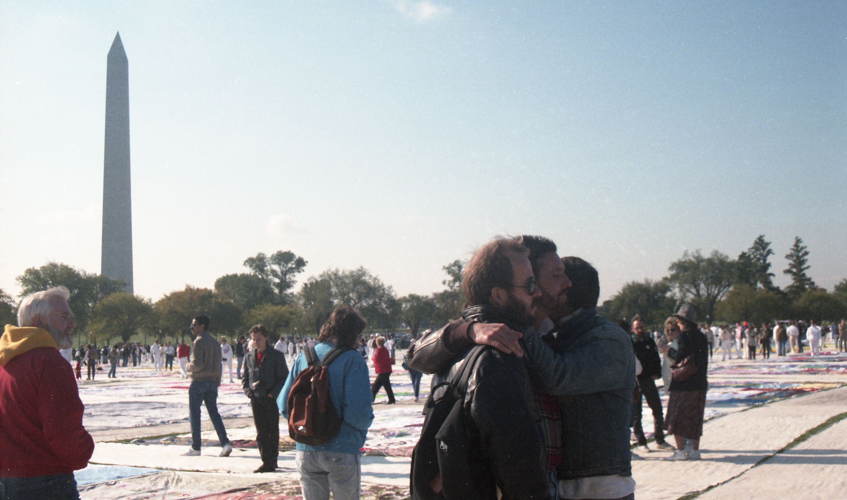 People gather at the AIDS Memorial Quilt on the National Mall in 1996