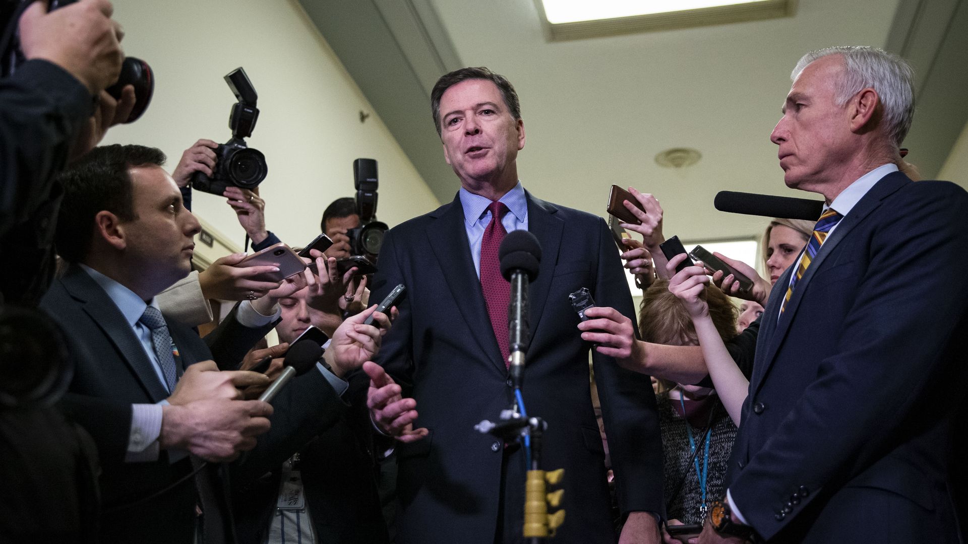  James Comey, former director of the Federal Bureau of Investigation (FBI), speaks to members of the media after testifying before the House Judiciary and House Oversight and Government Reform Committees joint investigation in Washington, D.C., U.S., on Friday, Dec. 7, 2018. 