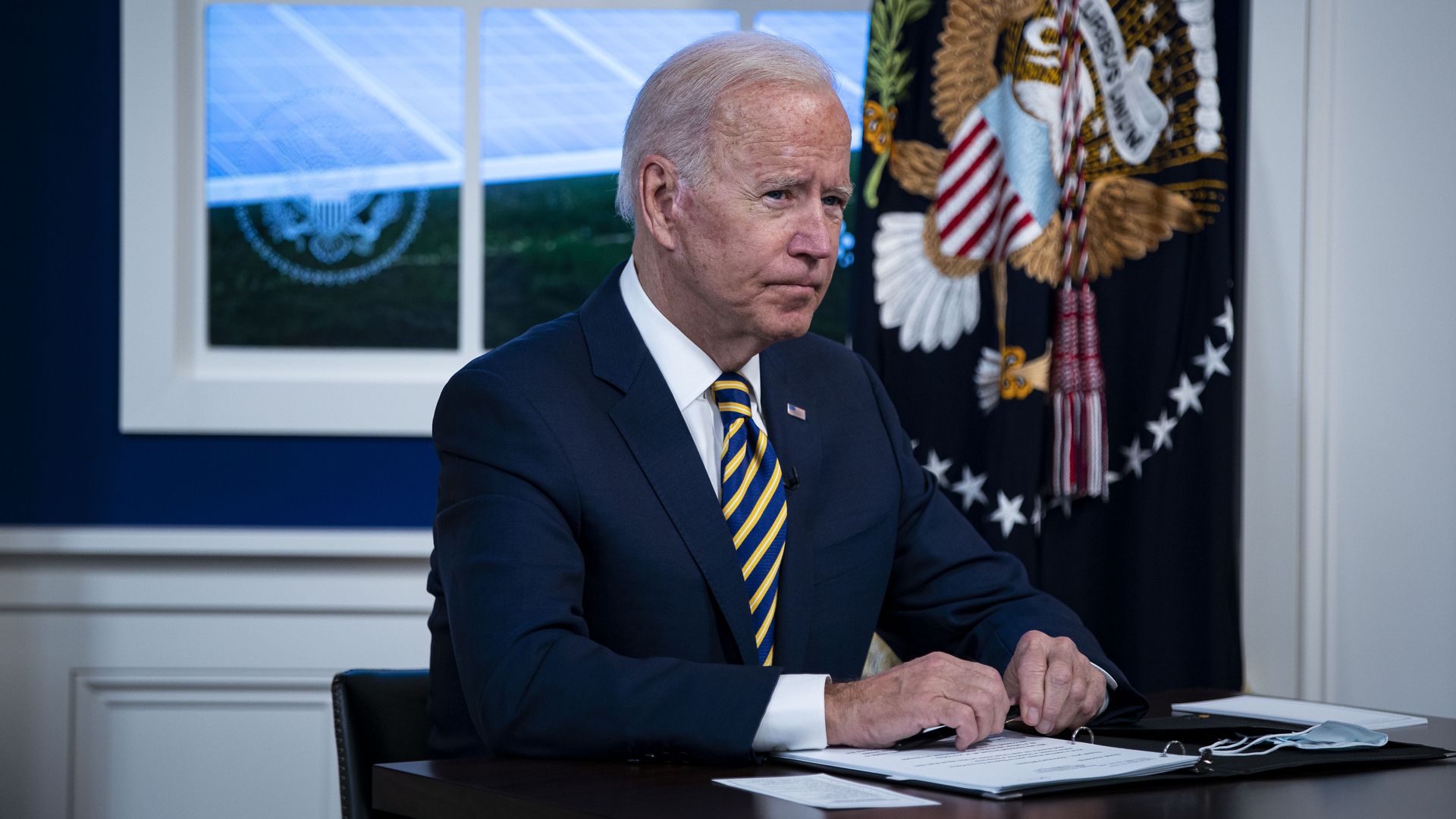 President Joe Biden participates in a conference call on climate change with the Major Economies Forum on Energy and Climate in the South Court Auditorium in the Eisenhower Executive Office Building.