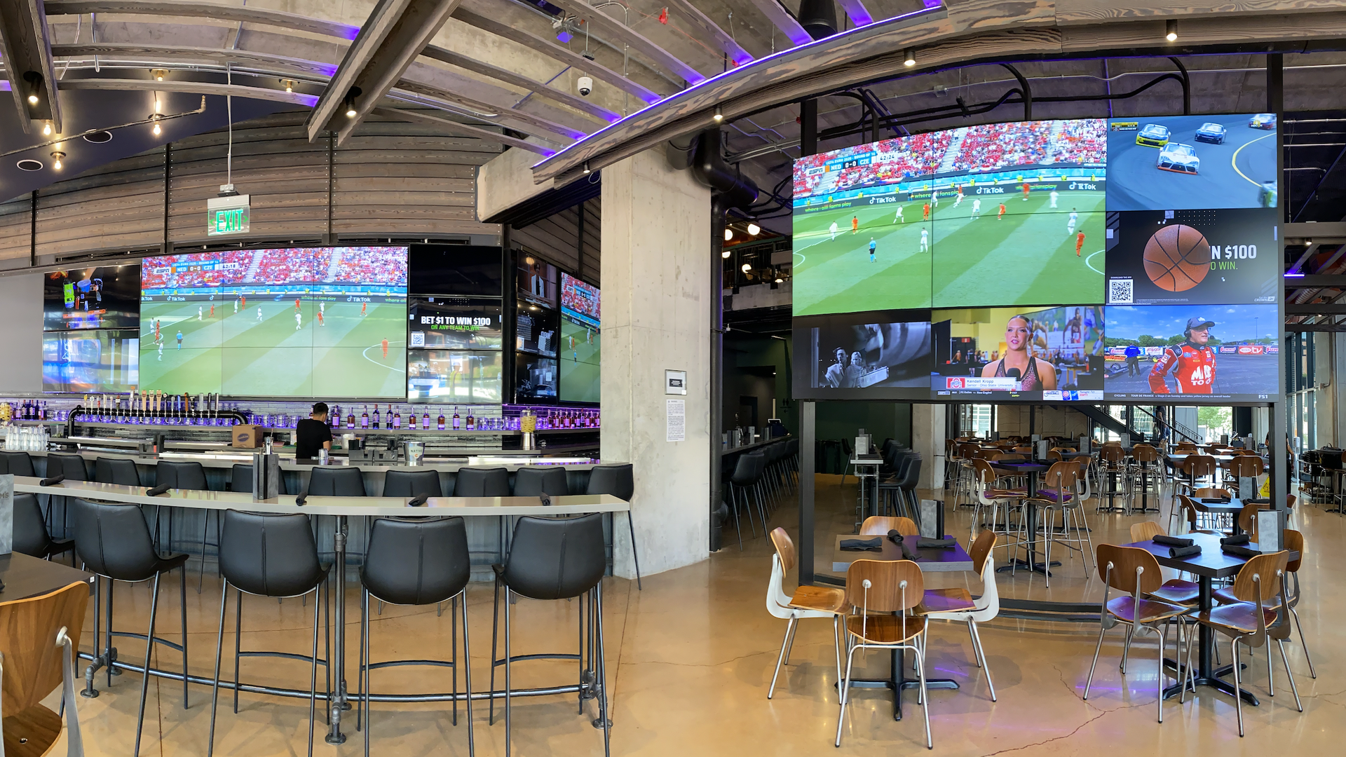 Inside a bar with big-screen TVs