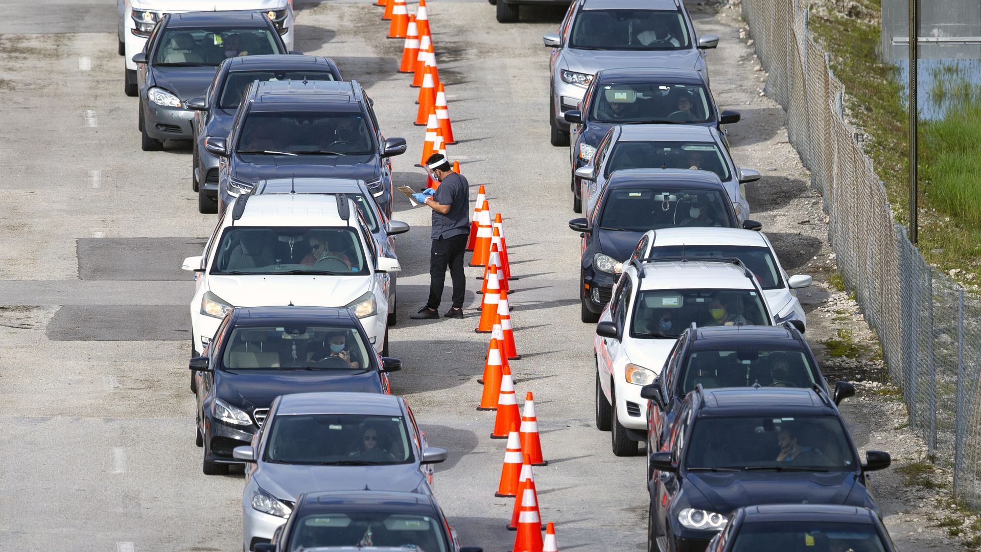 A COVID-19 drive-thru testing center yesterday at Hard Rock Stadium in Miami Gardens.