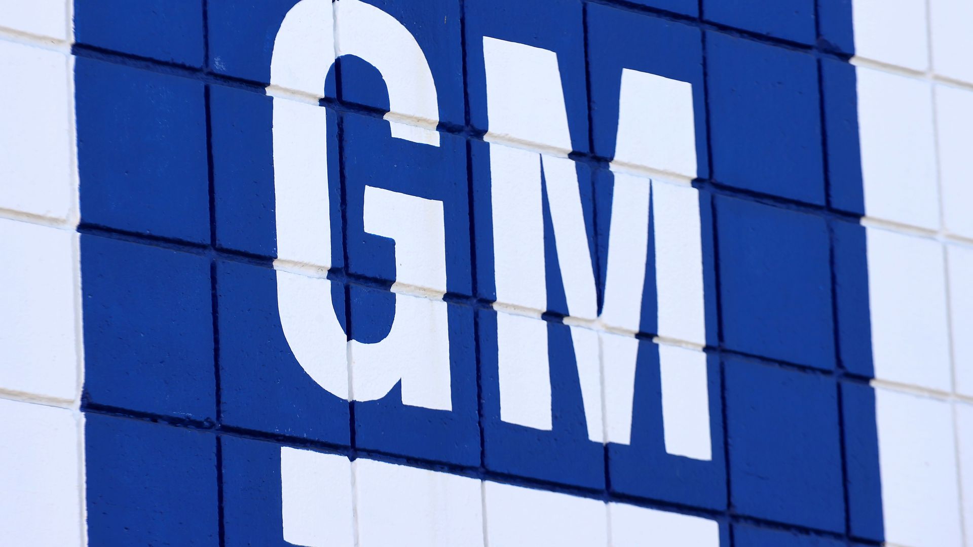 The General Motors logo is displayed at a Chevrolet dealership.
