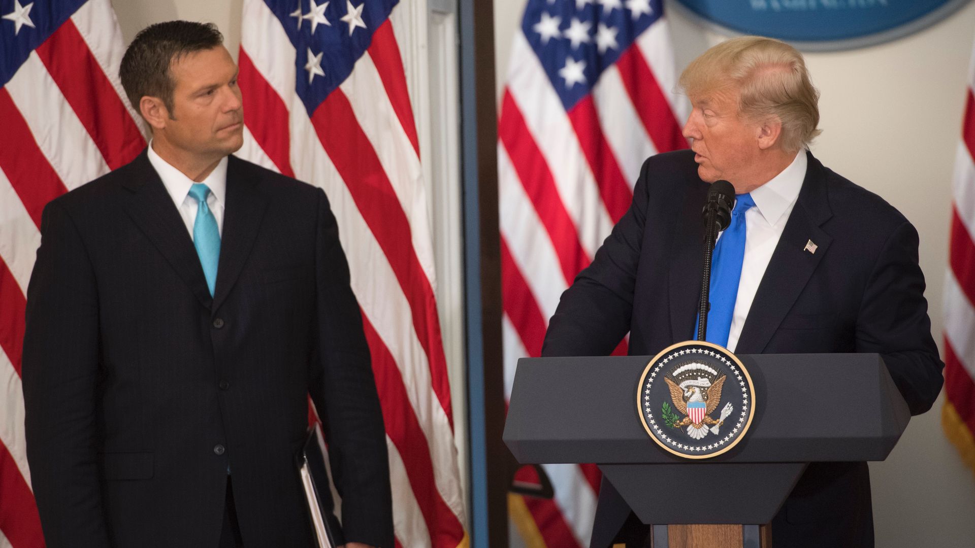 President Trump and Kansas Secretary of State Kris Kobach: Photo: Saul Loeb/AFP/Getty Images