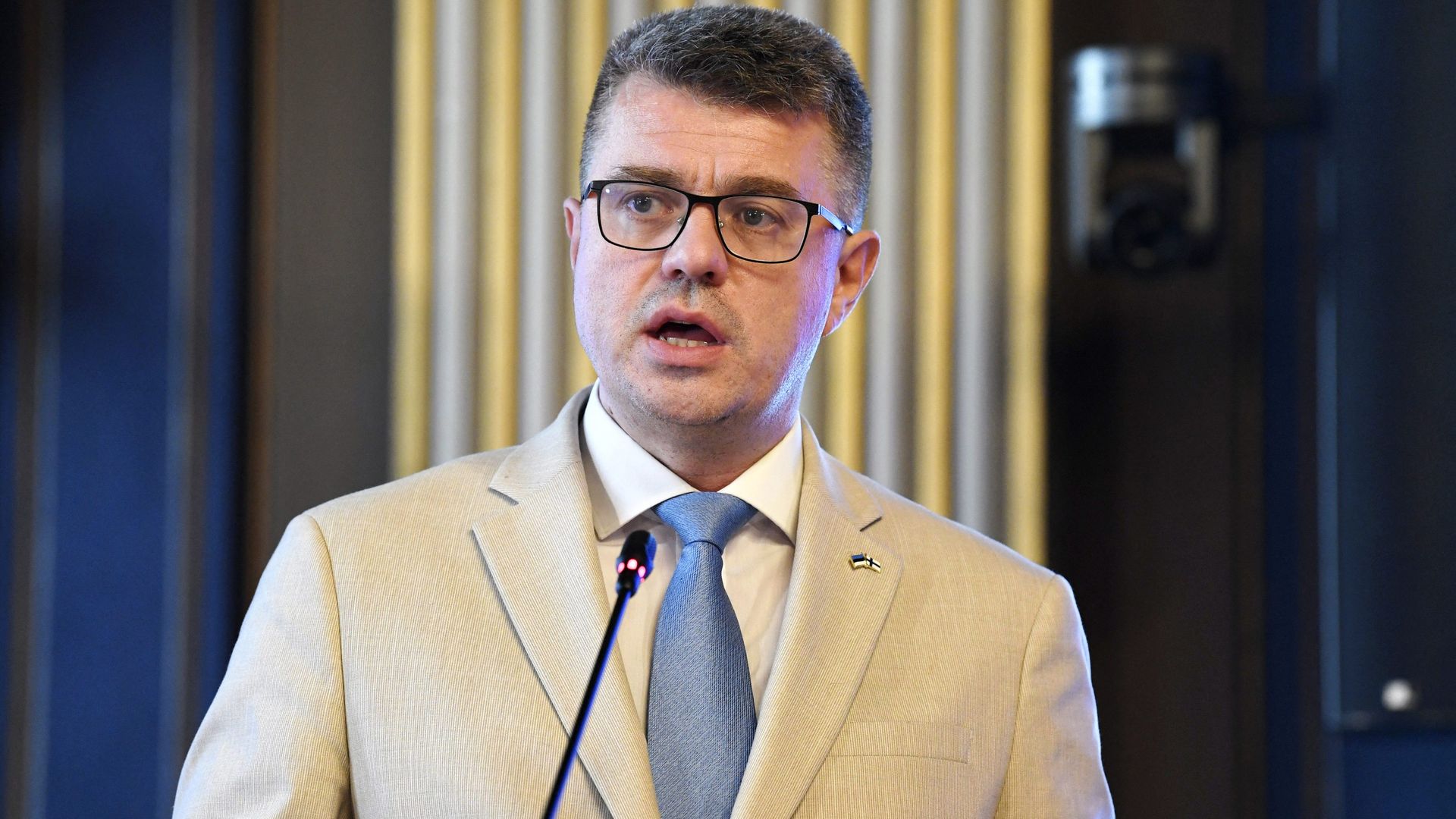 Estonia's Foreign Minister Urmas Reinsalu speaking during a press conference in Helsinki, Finland, on August 17.