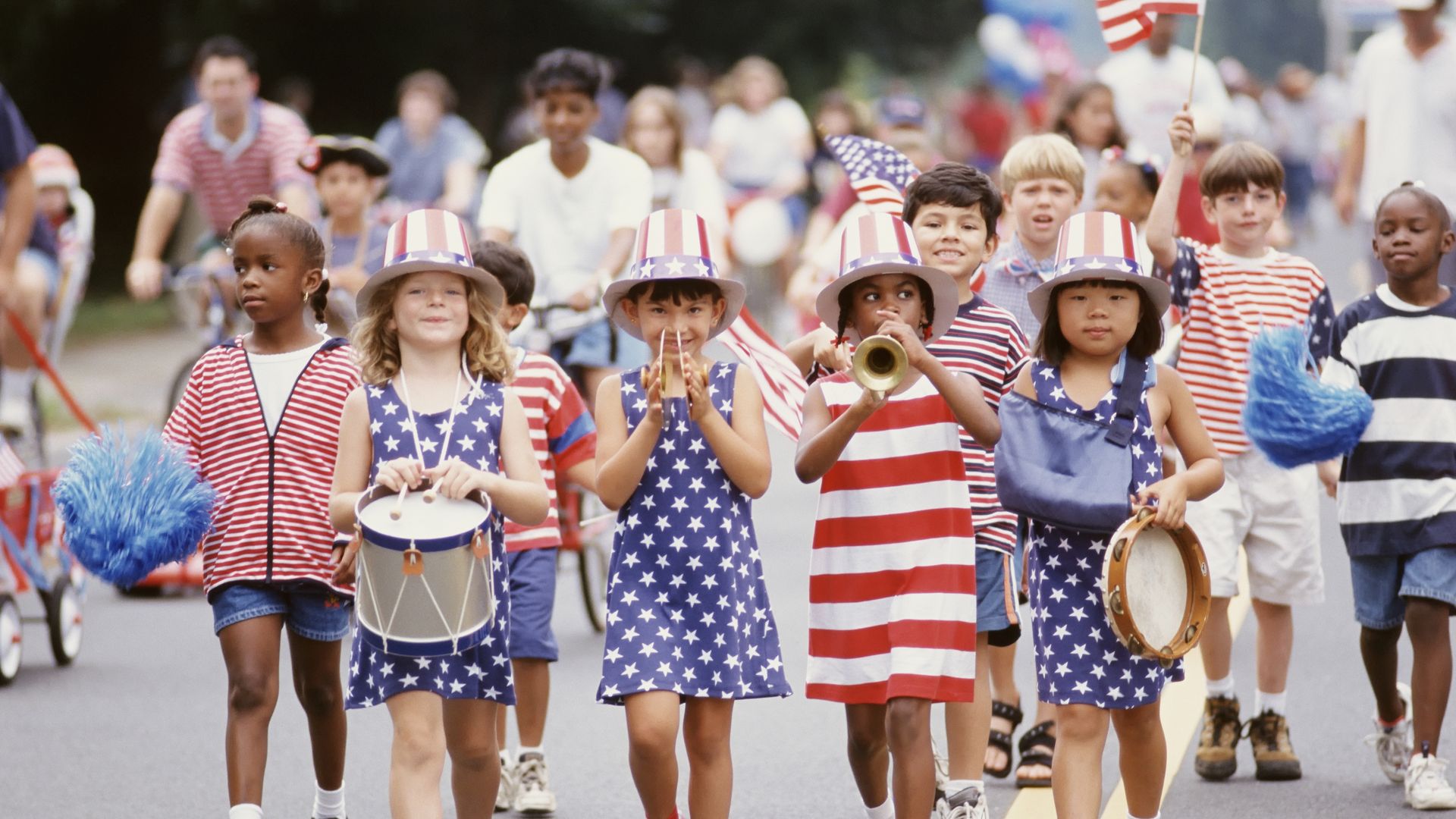 Children marching in 4th of July parade