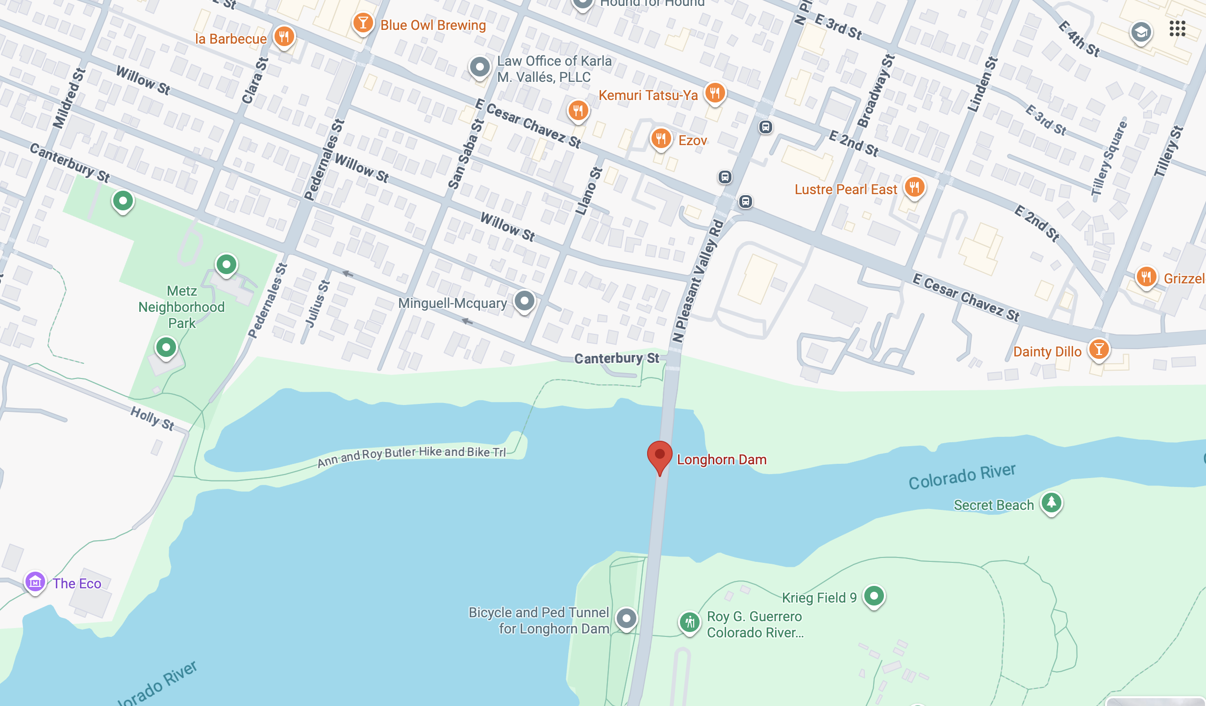 Map showing Longhorn Dam on the Colorado River, Metz Neighborhood Park, Roy G. Guerrero Colorado River park, nearby streets like Canterbury St, Pedernales St, and eateries such as Kemuri Tatsu-Ya.