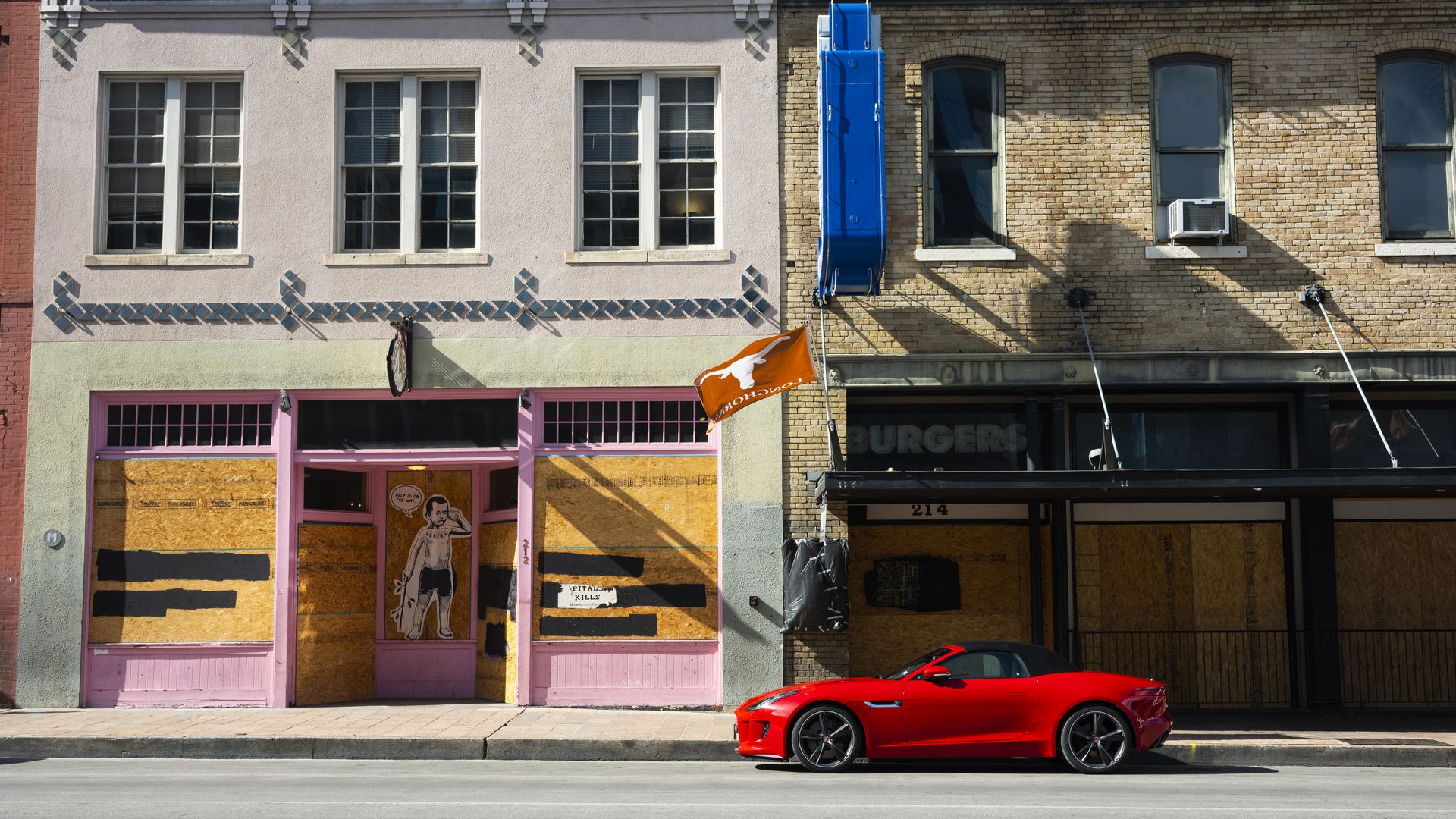 Boarded up businesses on Sixth Street in Austin.