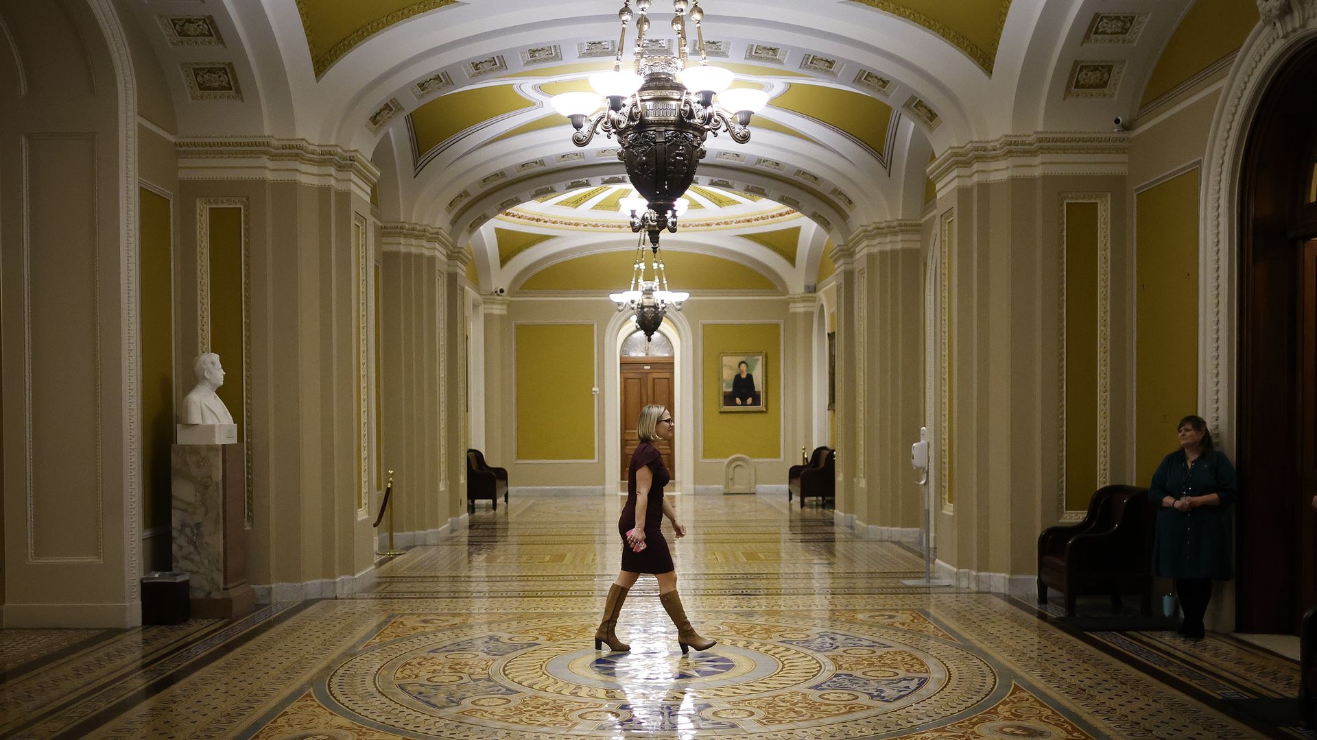 Kyrsten Sinema walking in the Capitol.