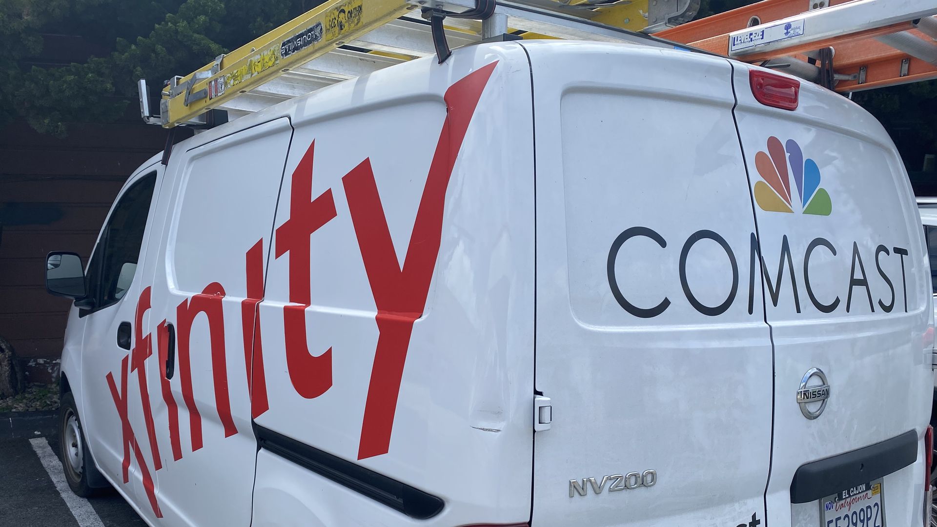 A photo of a white Comcast Xfinity van